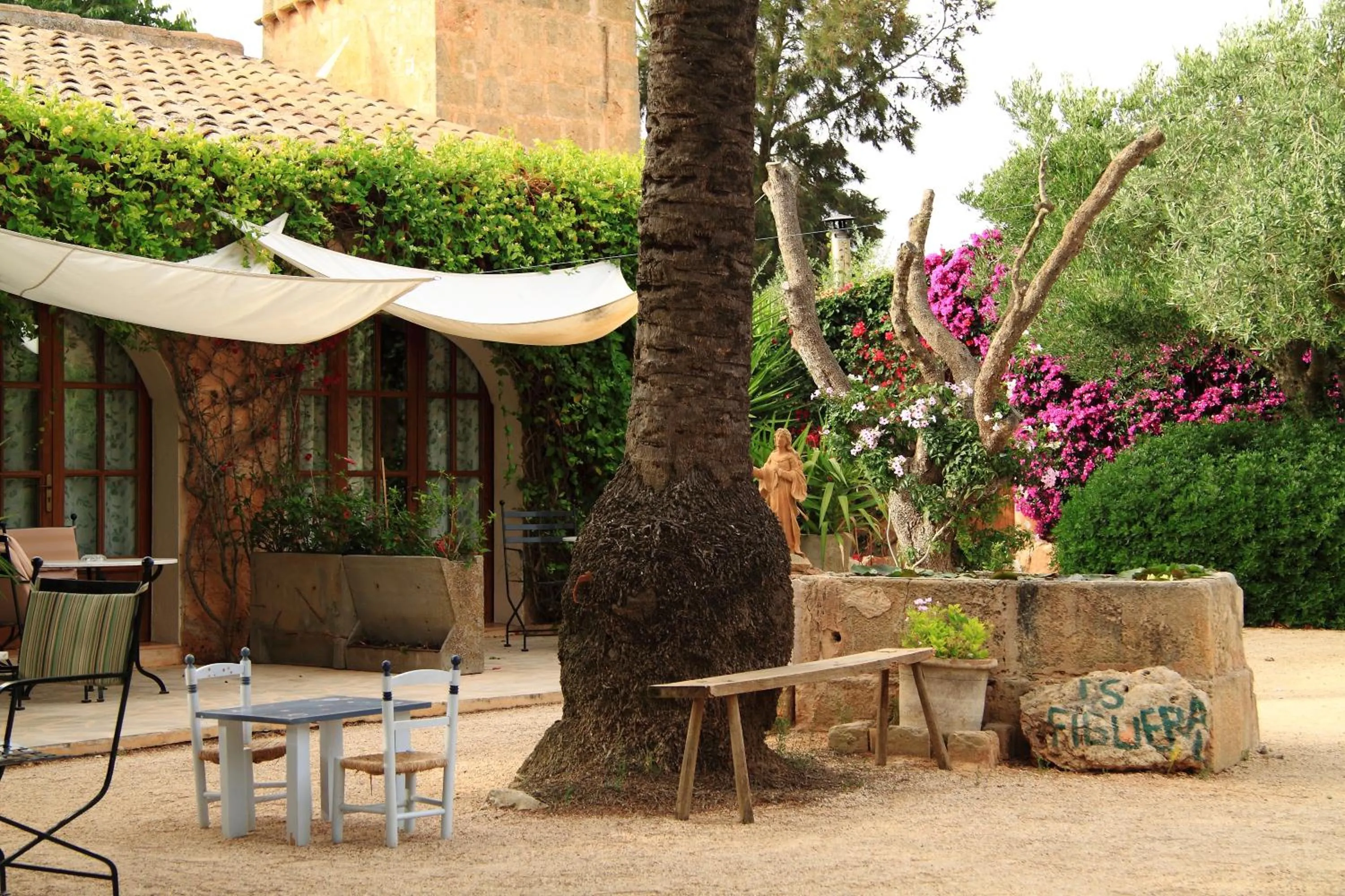 Garden in Petit Hotel Es Figueral
