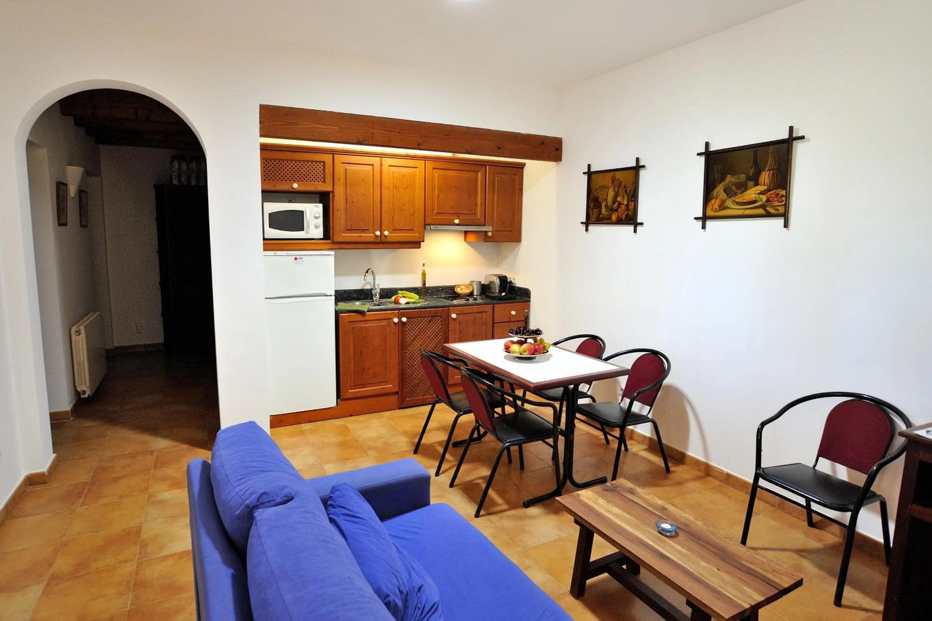 Kitchen or kitchenette in Petit Hotel Es Figueral