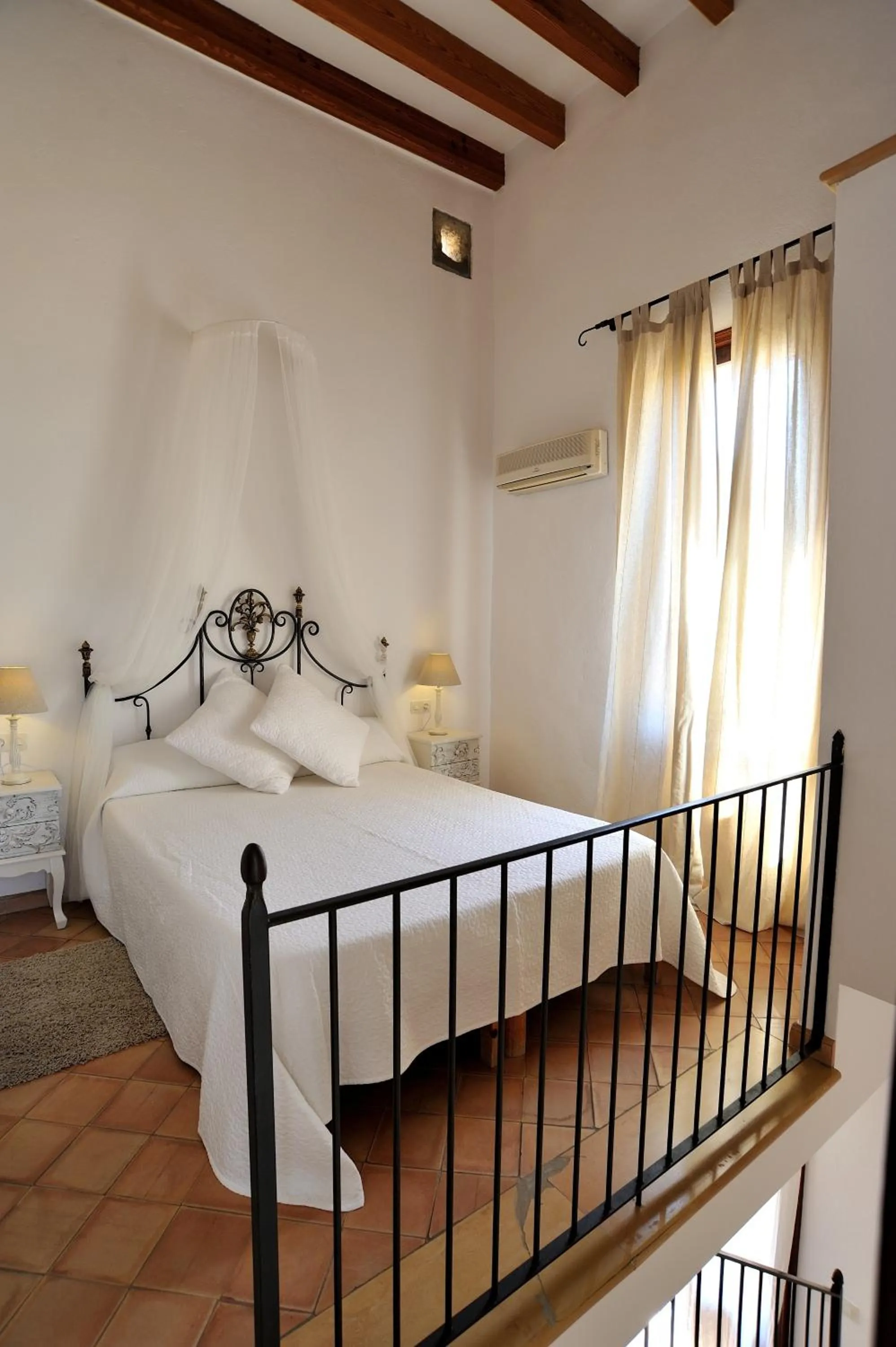 Bed in Petit Hotel Es Figueral