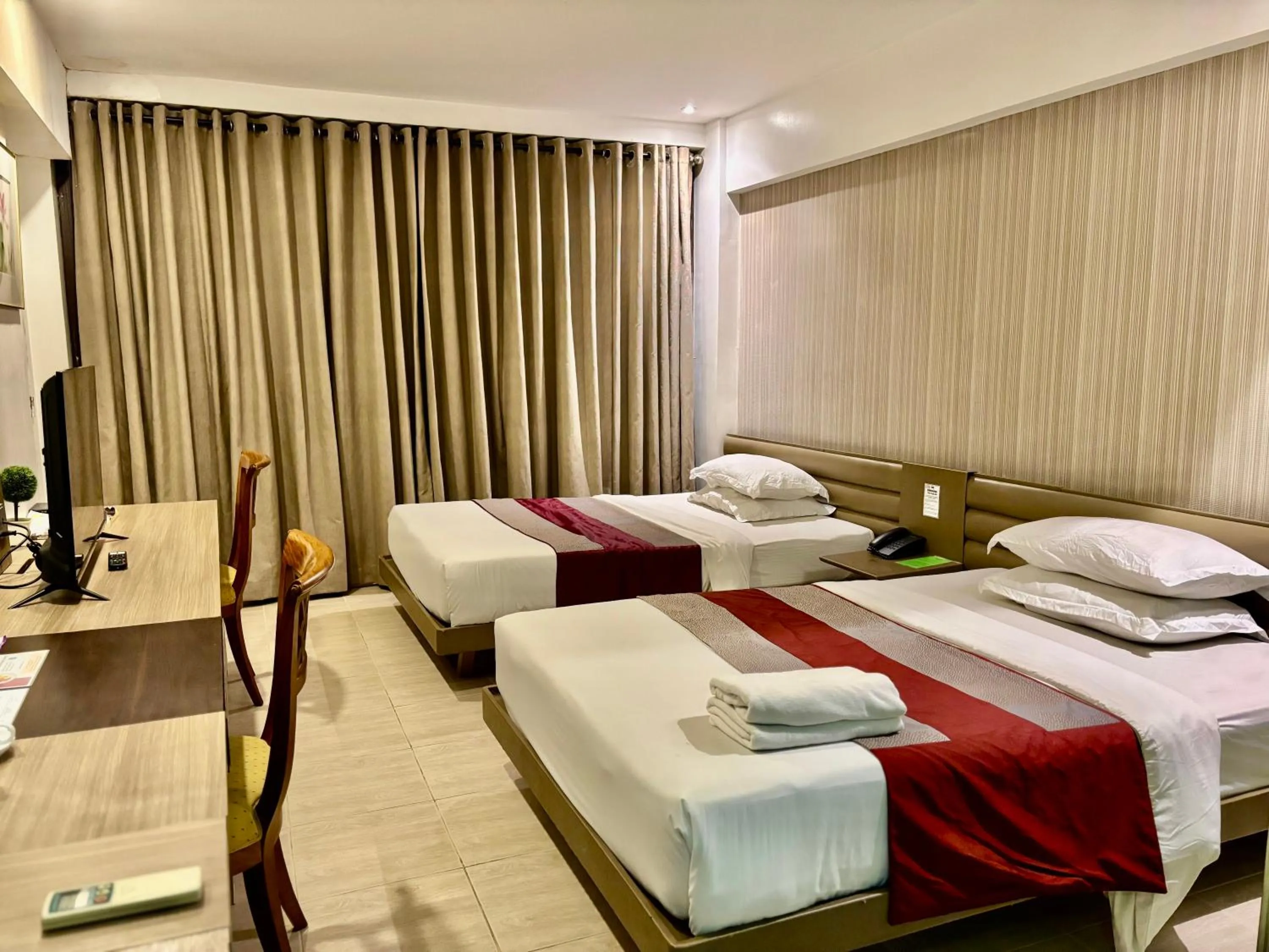 Bed in The E-Hotel Makati