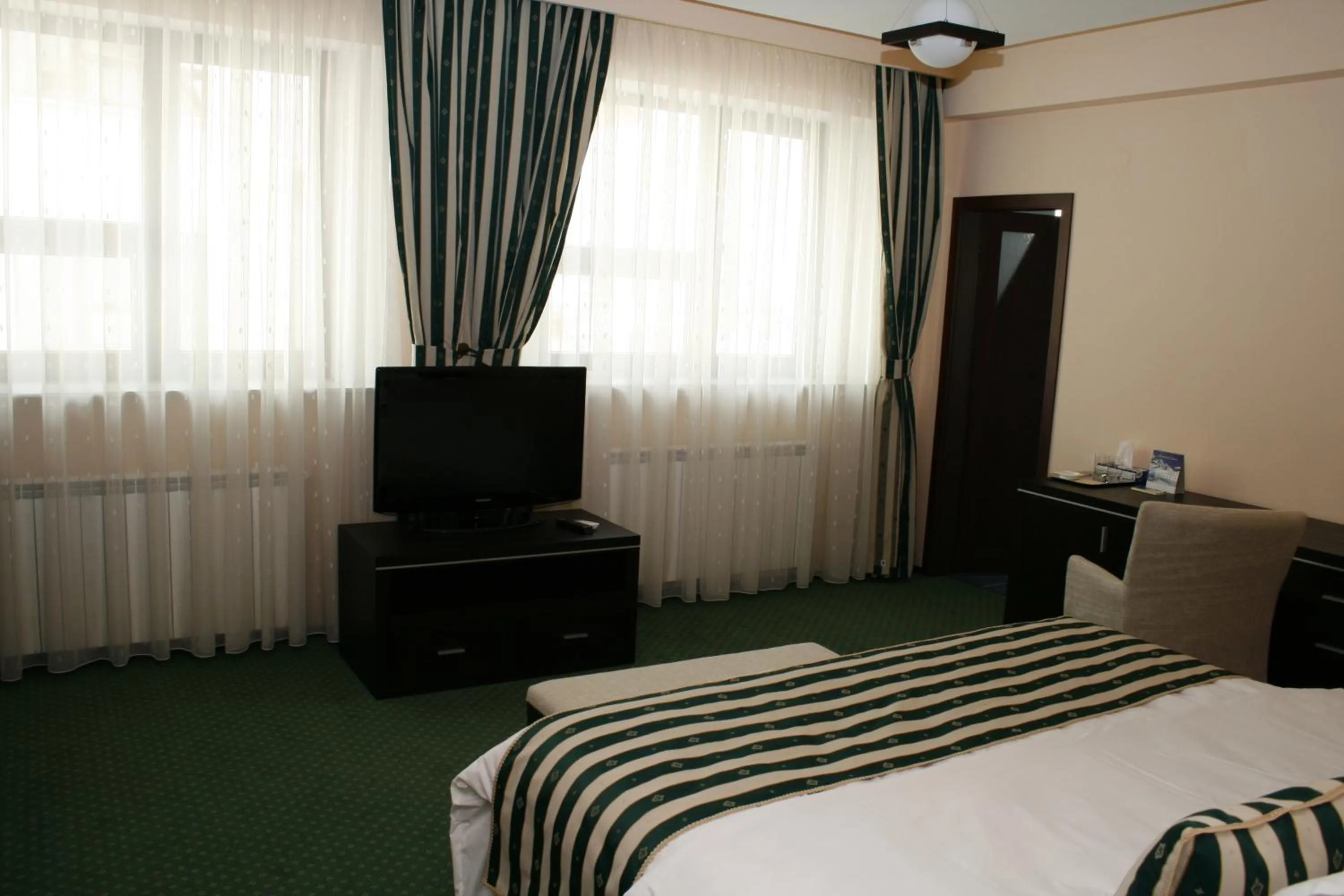 Bed in Pensiunea President