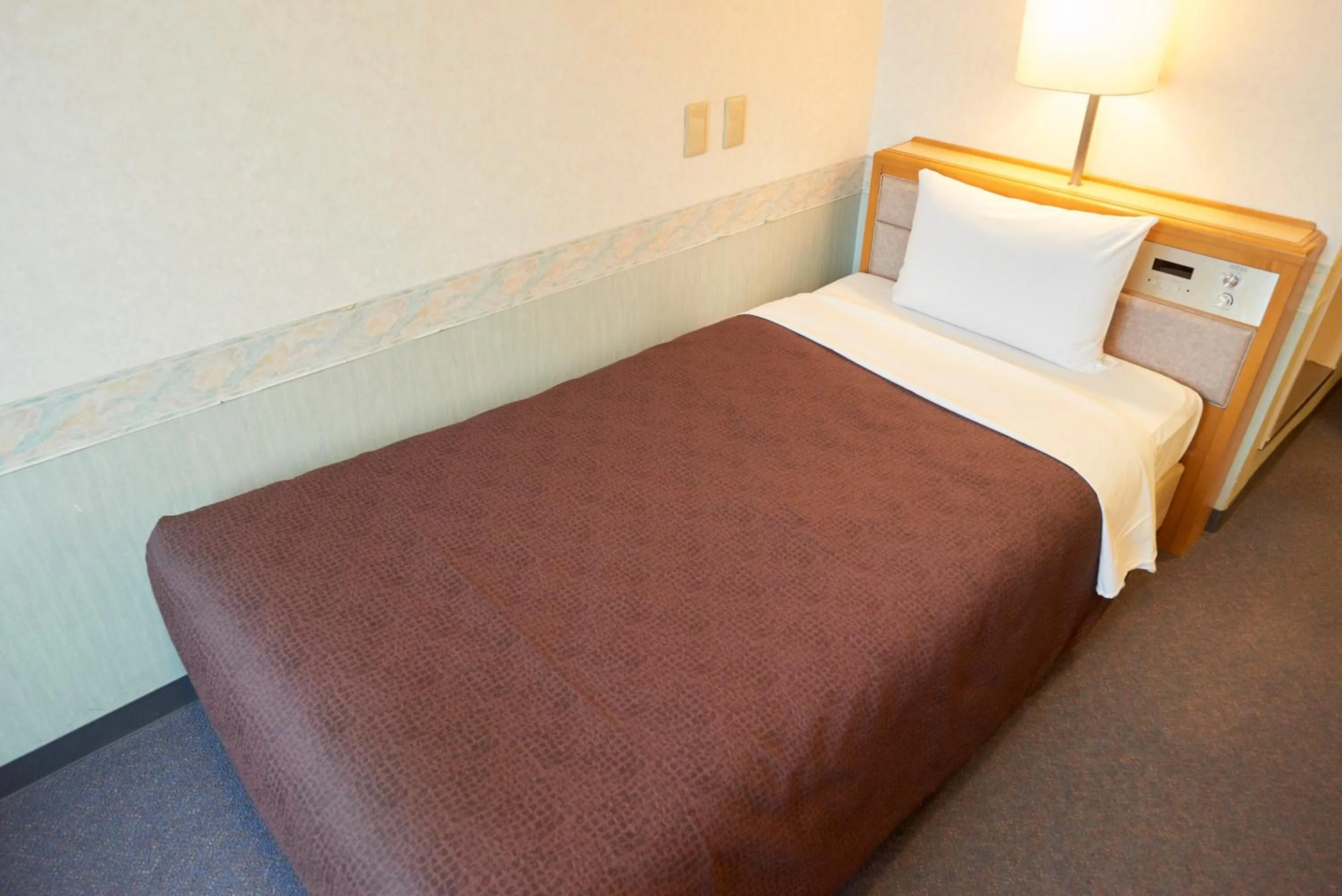 Bed in Hotel Select Inn Aomori