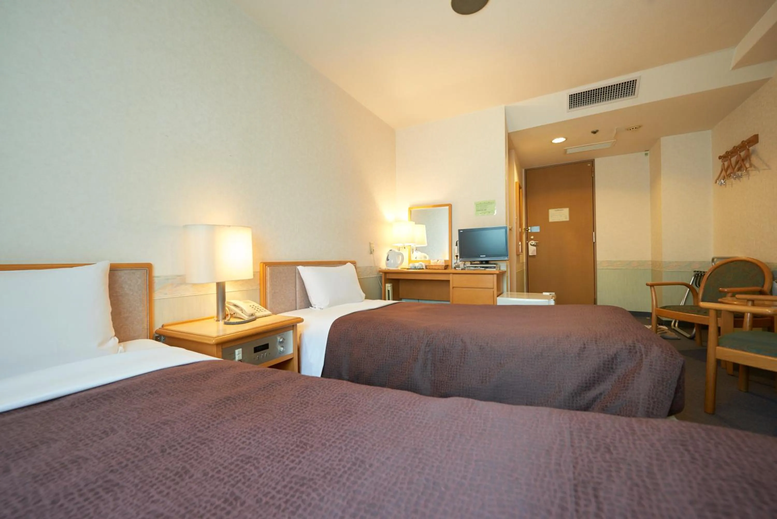 Bed in Hotel Select Inn Aomori