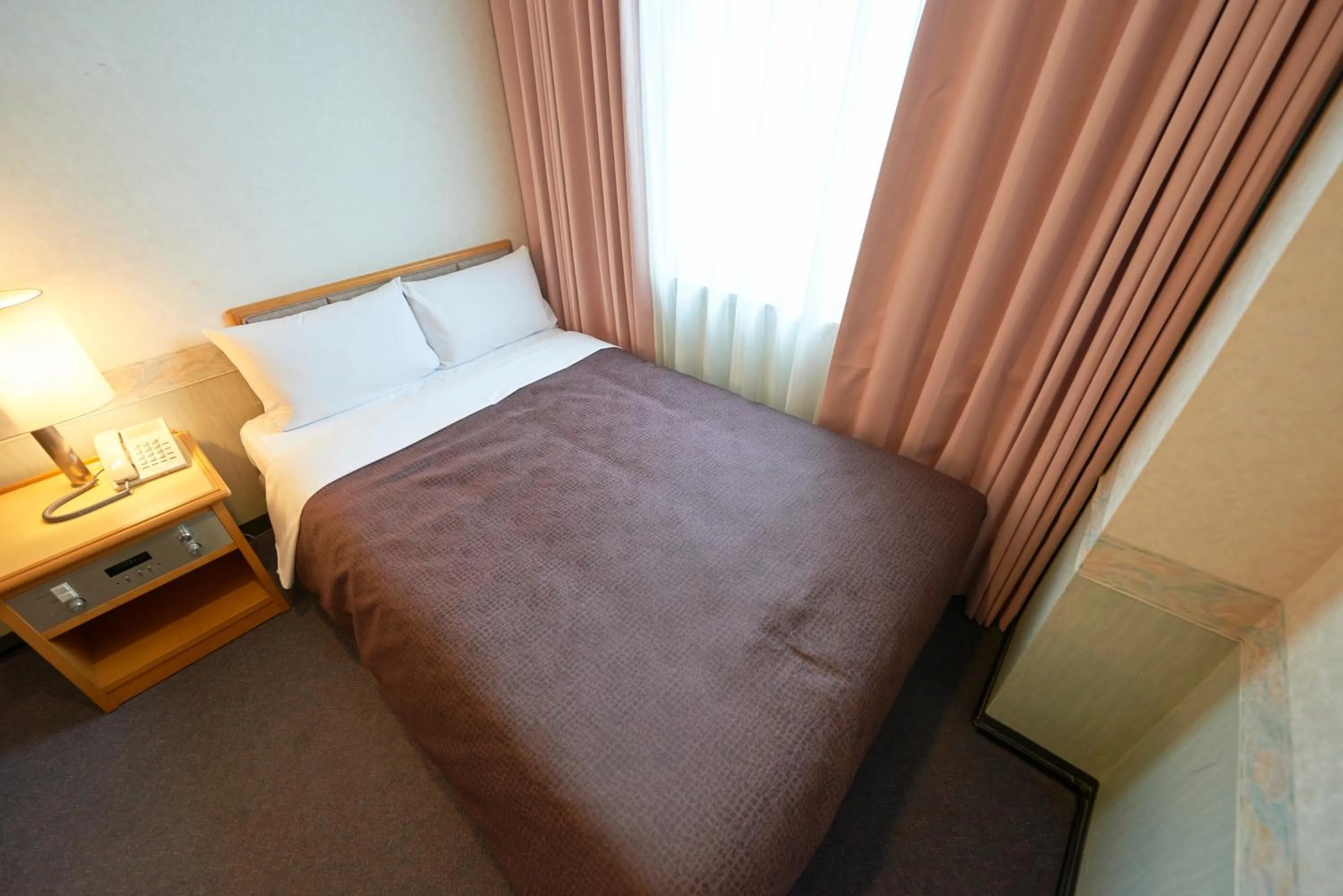 Bed in Hotel Select Inn Aomori