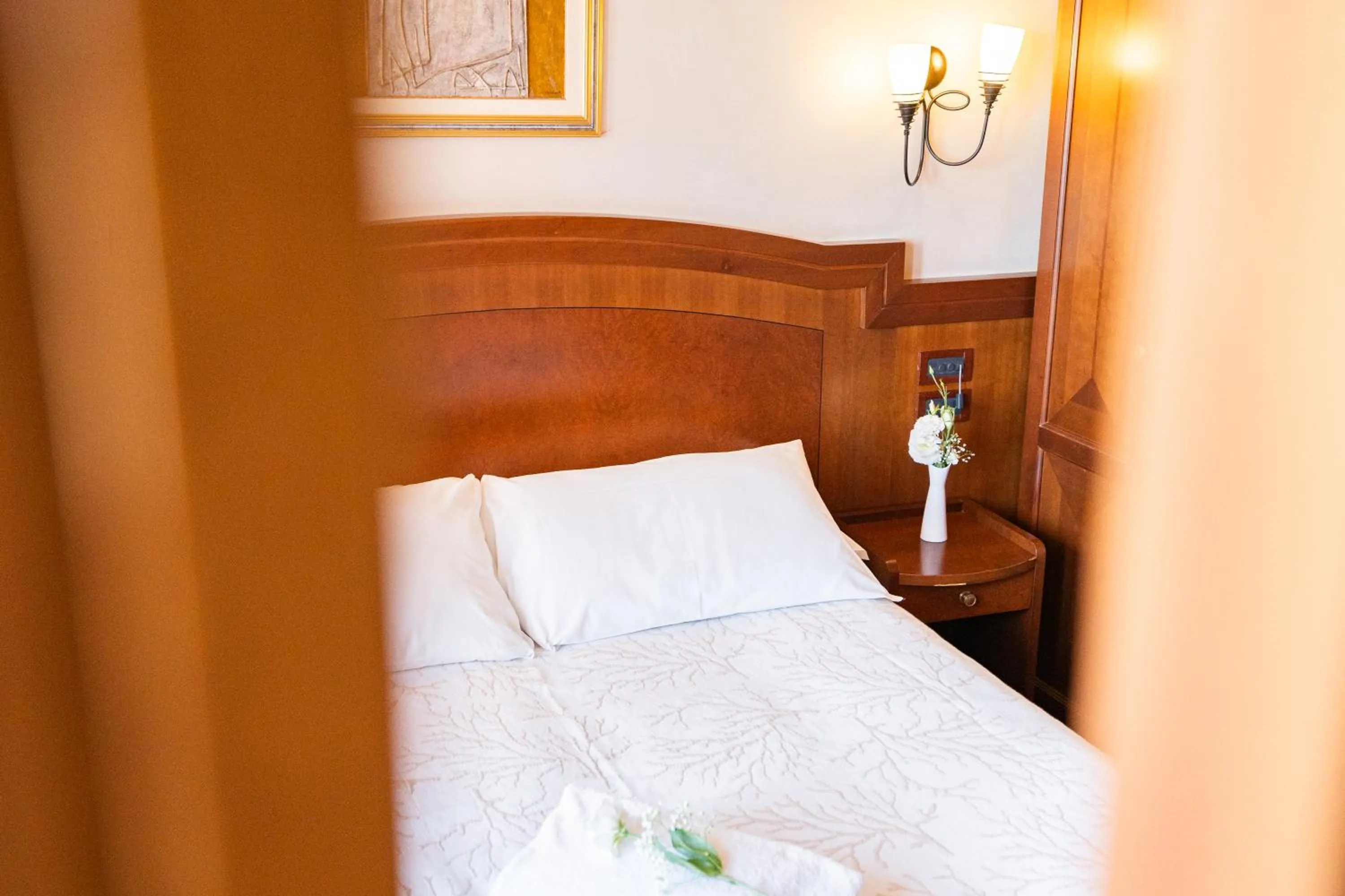 Bed in Art Hotel Santa Lucia