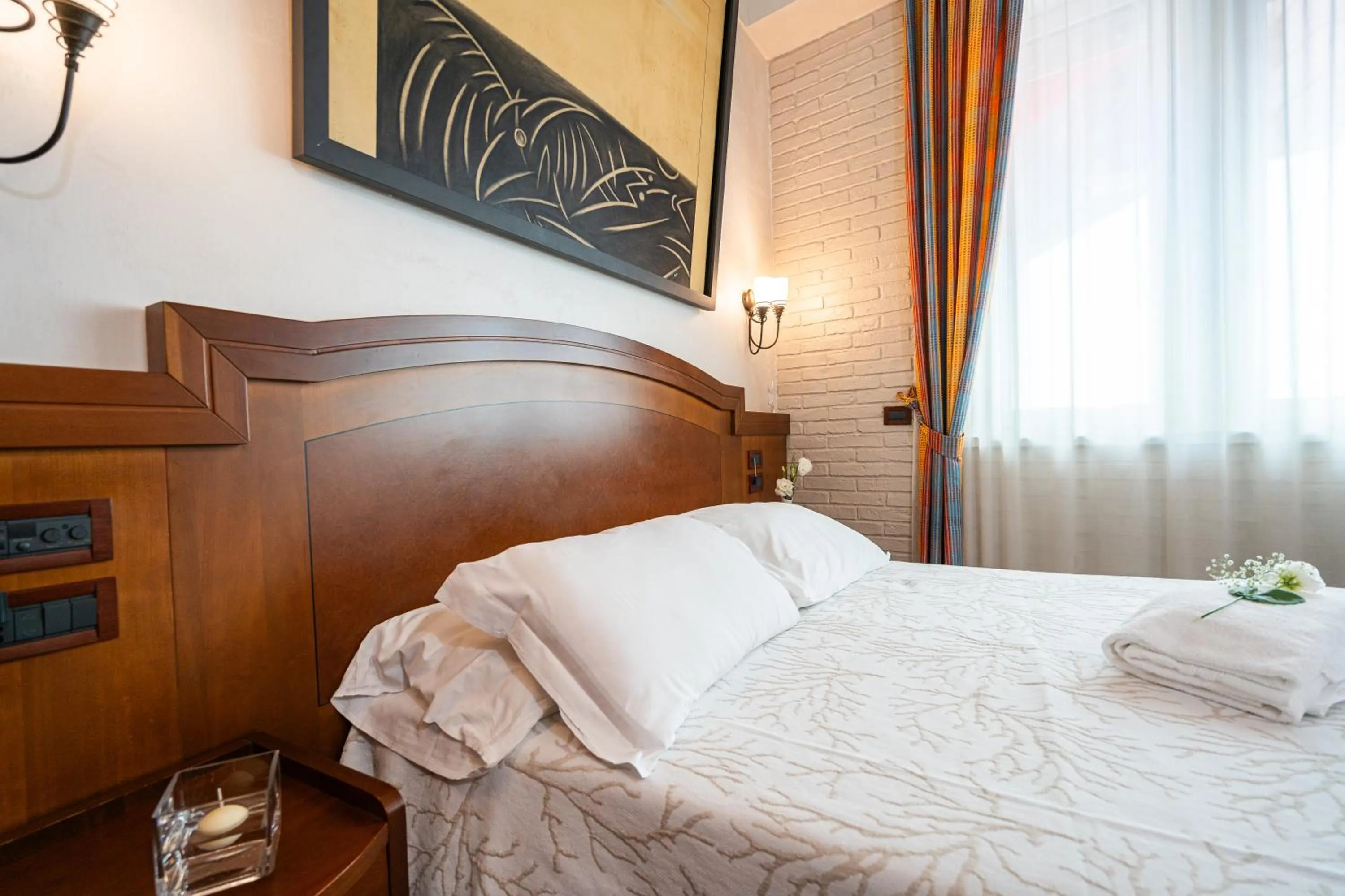 Bed in Art Hotel Santa Lucia