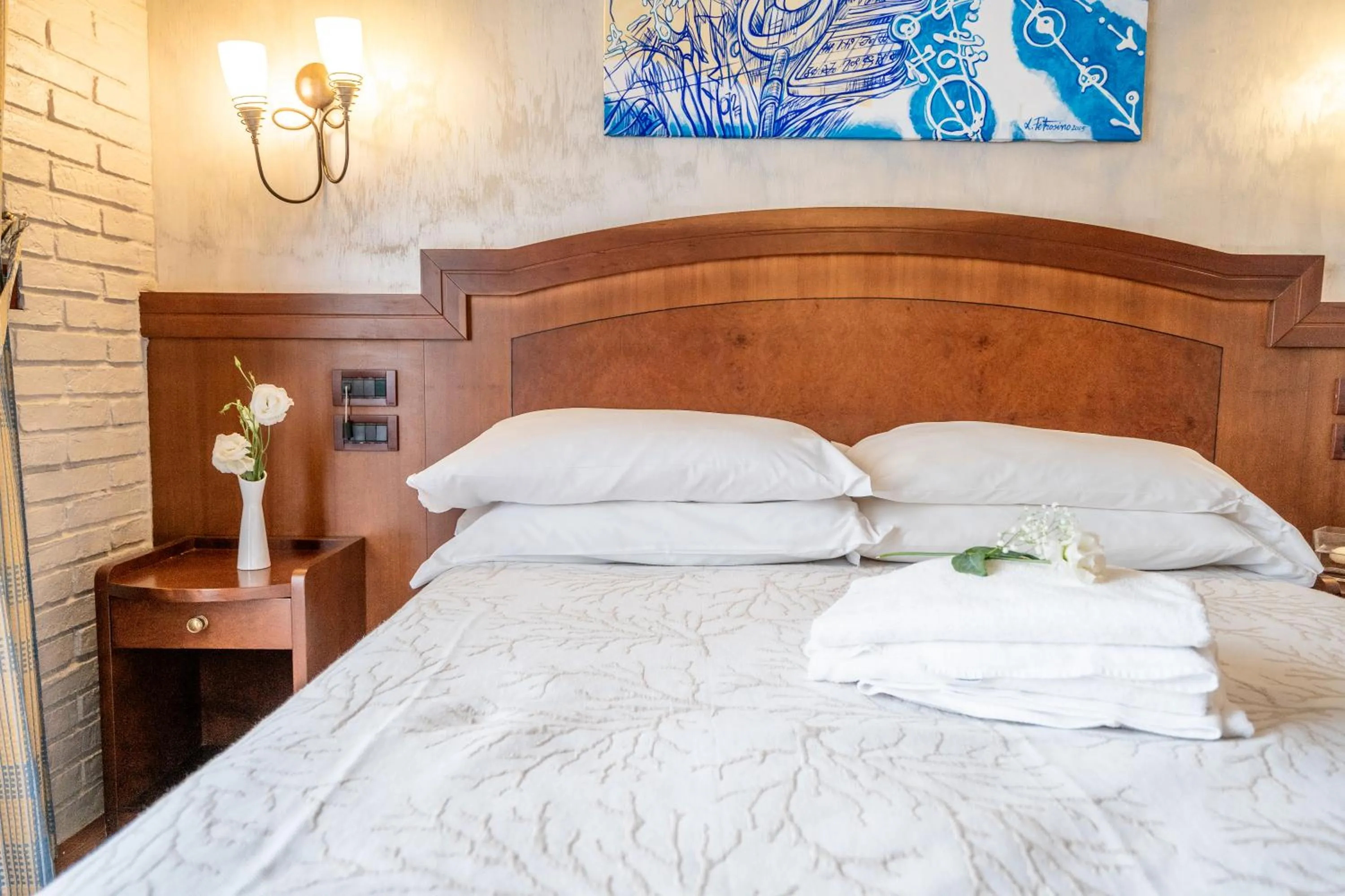 Bed in Art Hotel Santa Lucia