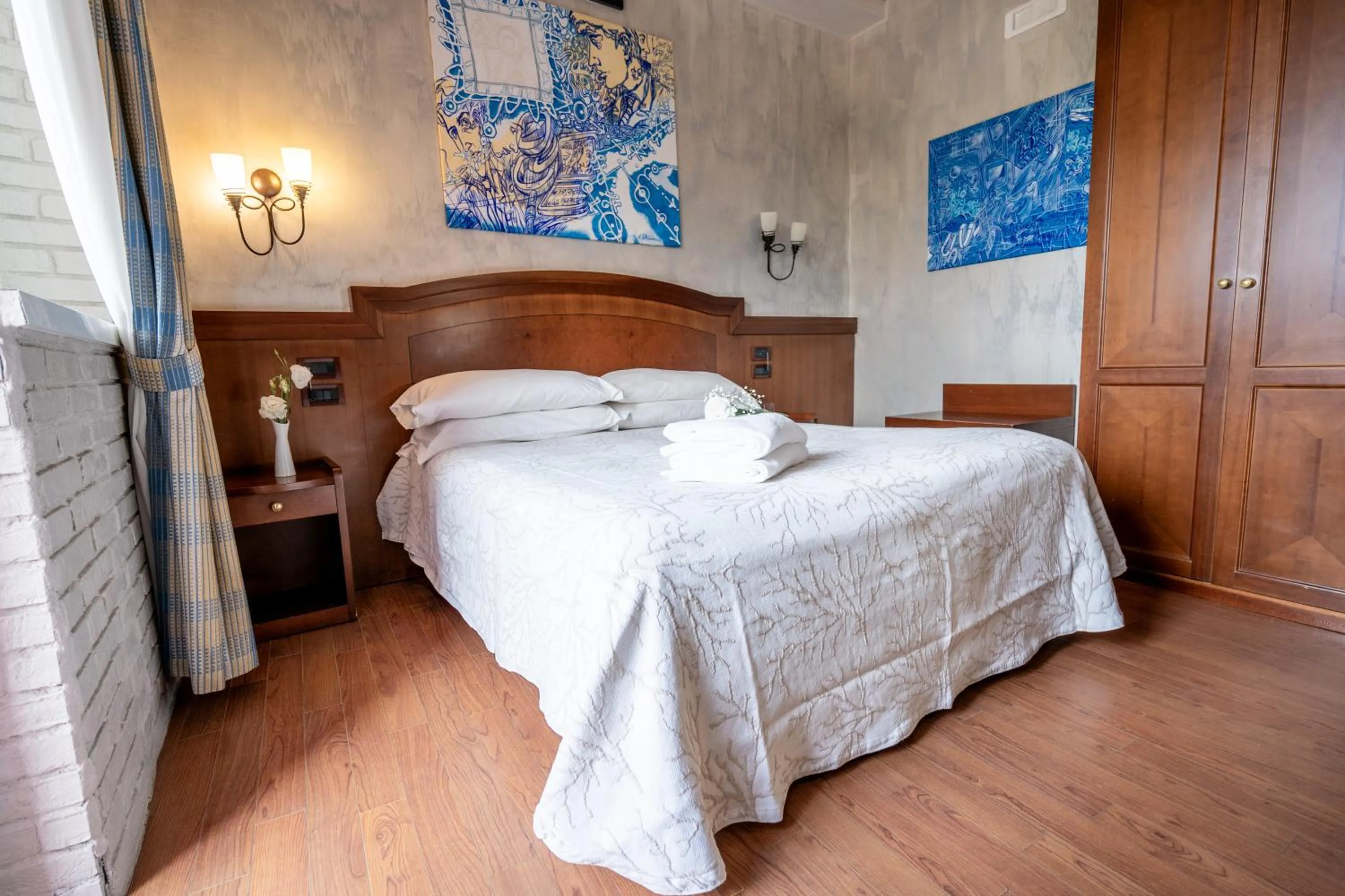 Bed in Art Hotel Santa Lucia