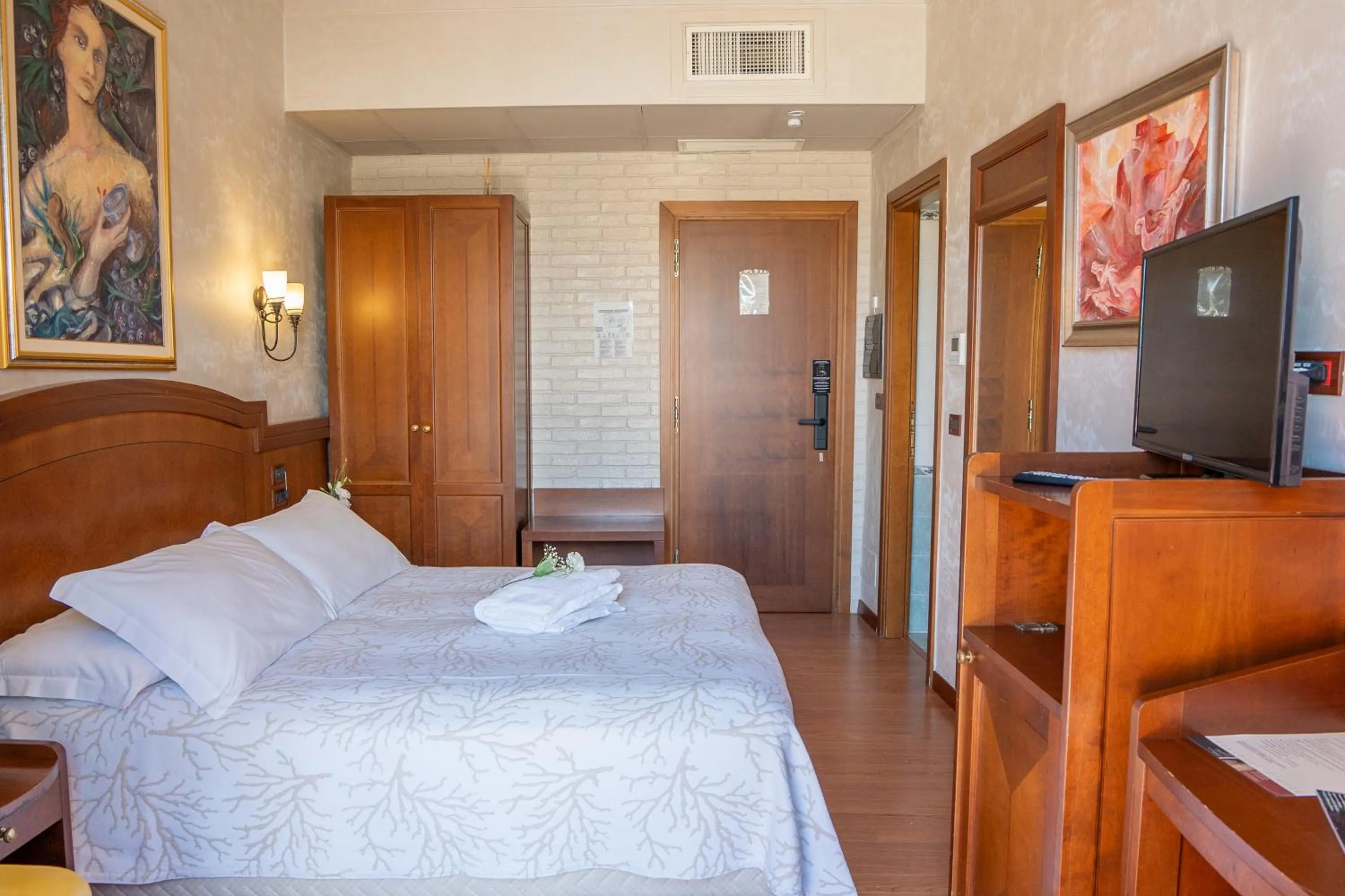 Bed in Art Hotel Santa Lucia