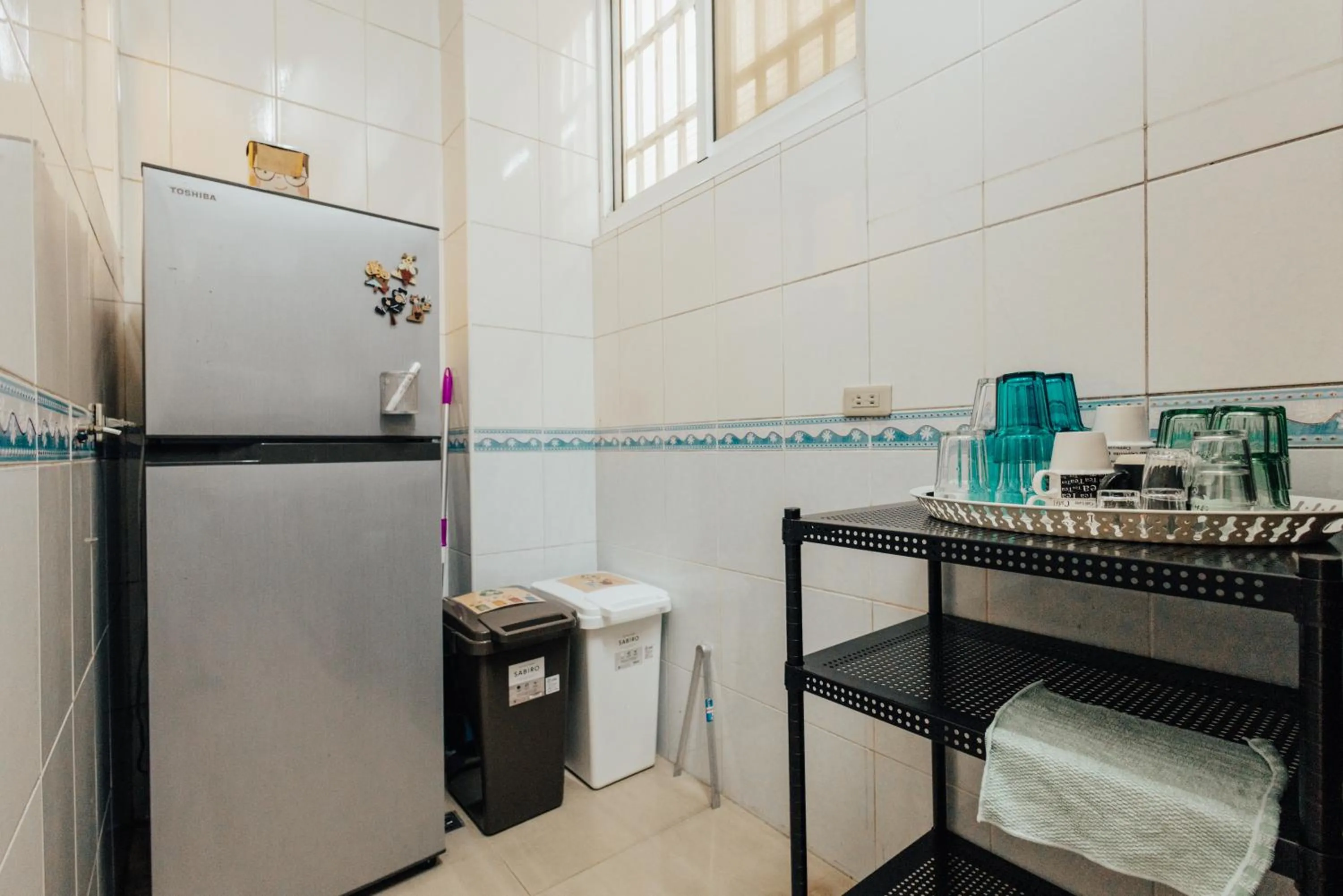 Kitchen or kitchenette in Maybe Homestay