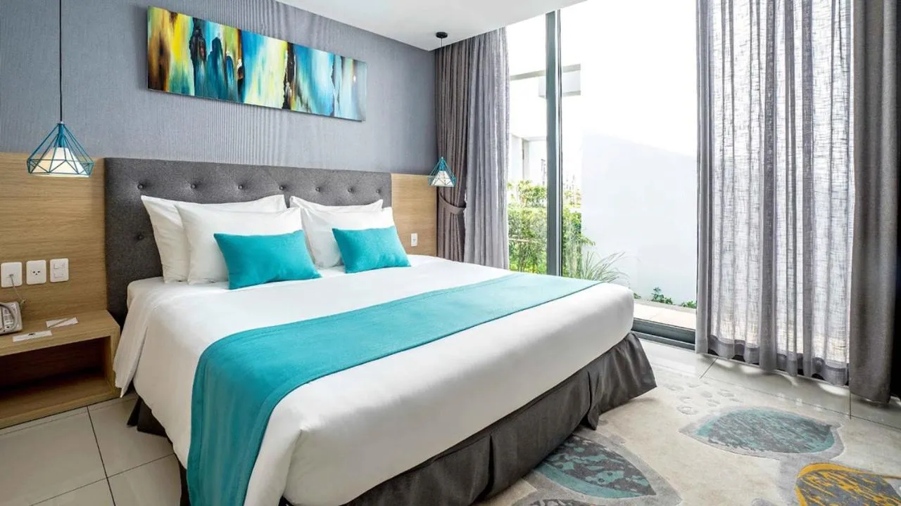 Bed in Villas at Oceanami Resort