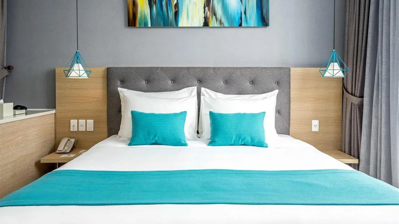 Bed in Villas at Oceanami Resort