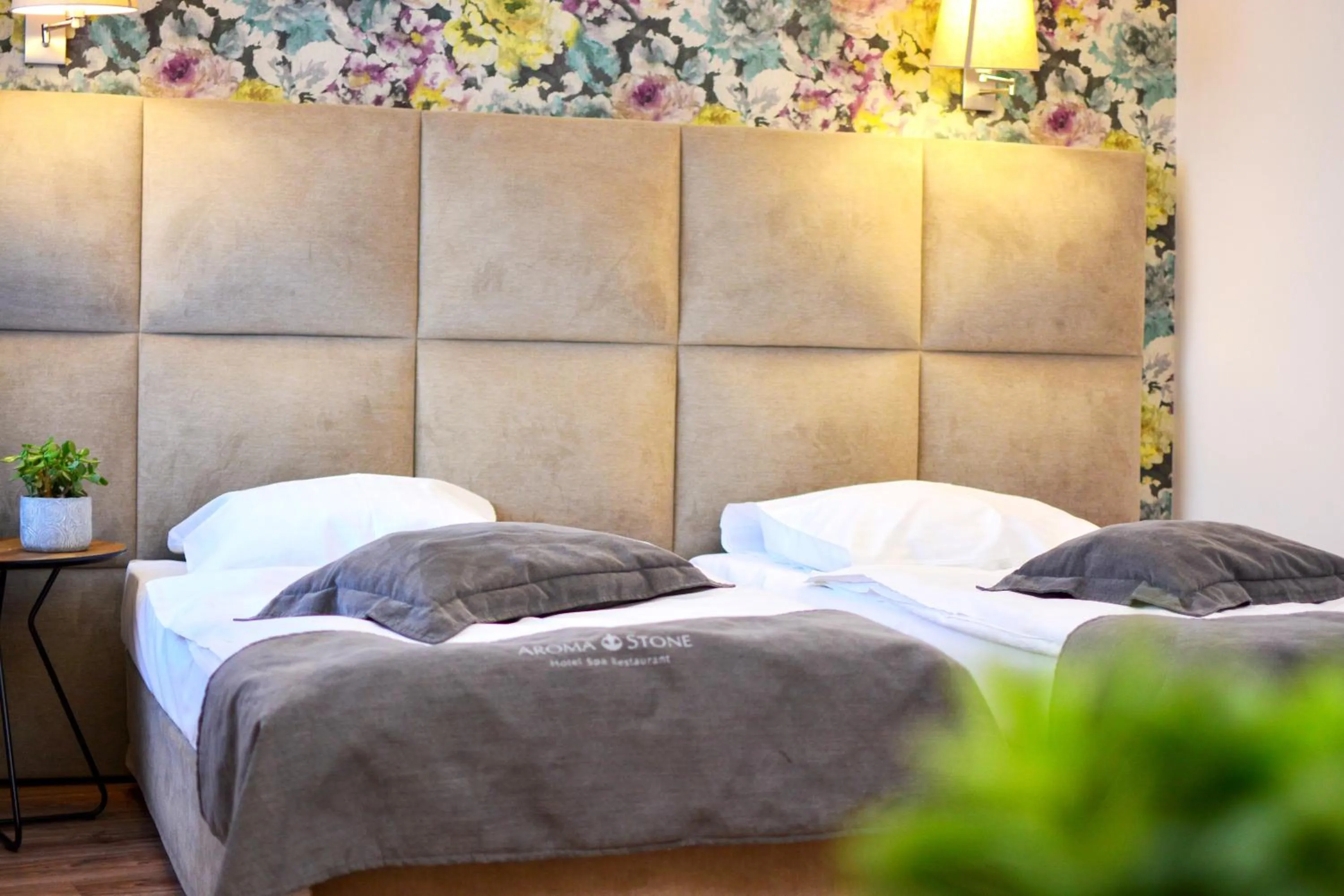 Bed in Aroma Stone Hotel Spa