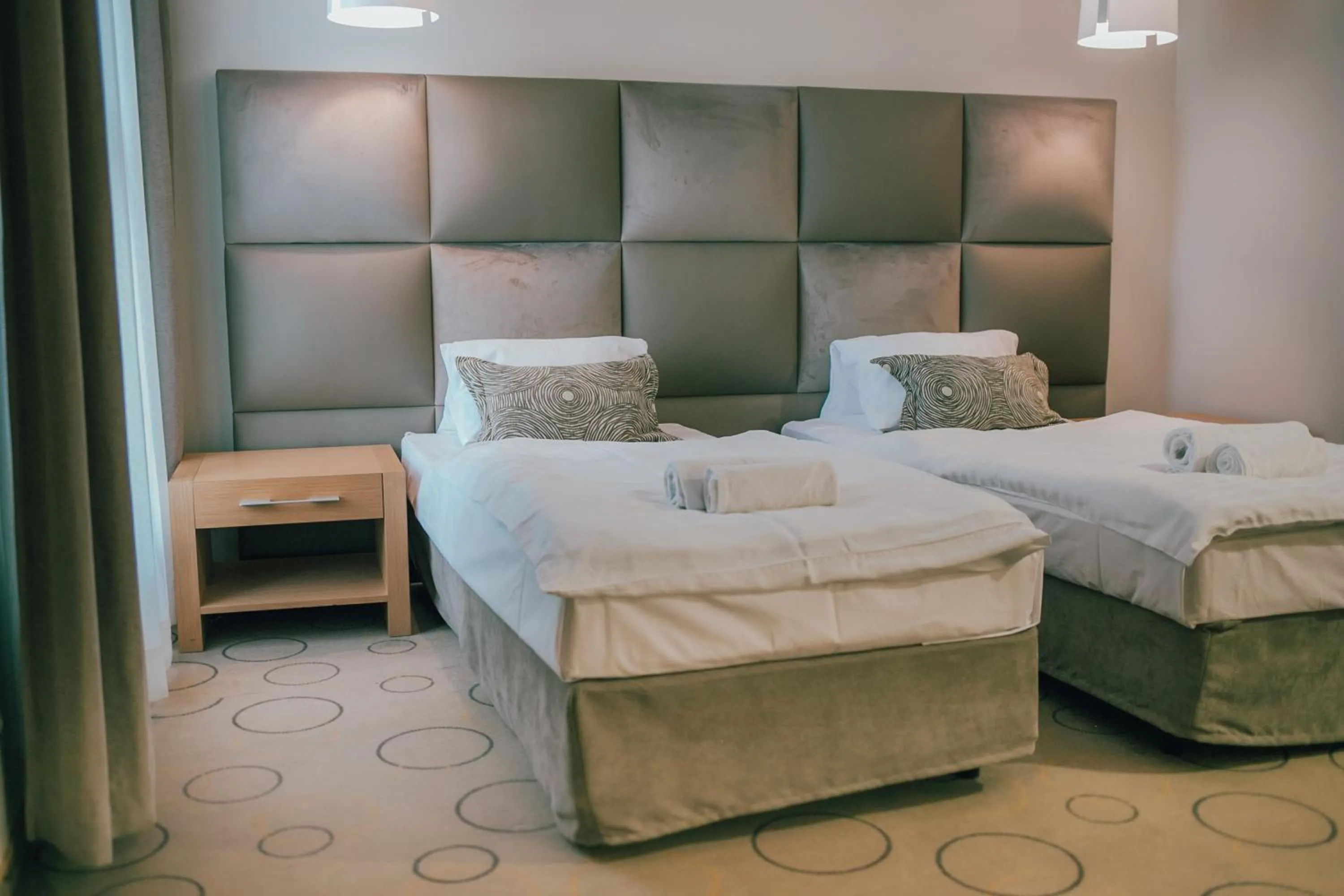 Bed in Aroma Stone Hotel Spa