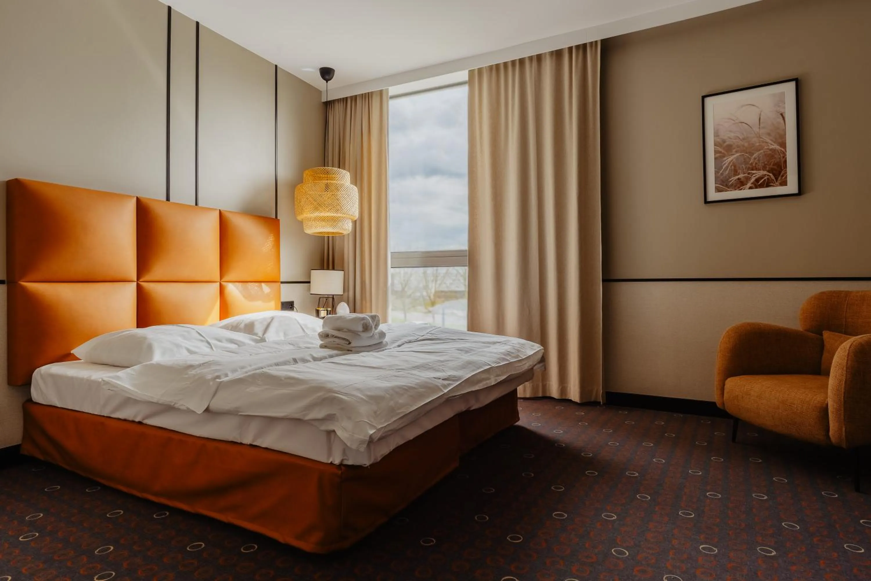 Bed in Aroma Stone Hotel Spa