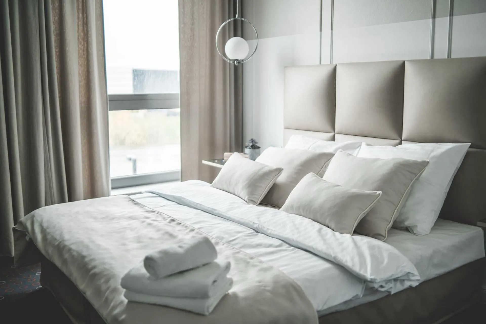 Bed in Aroma Stone Hotel Spa