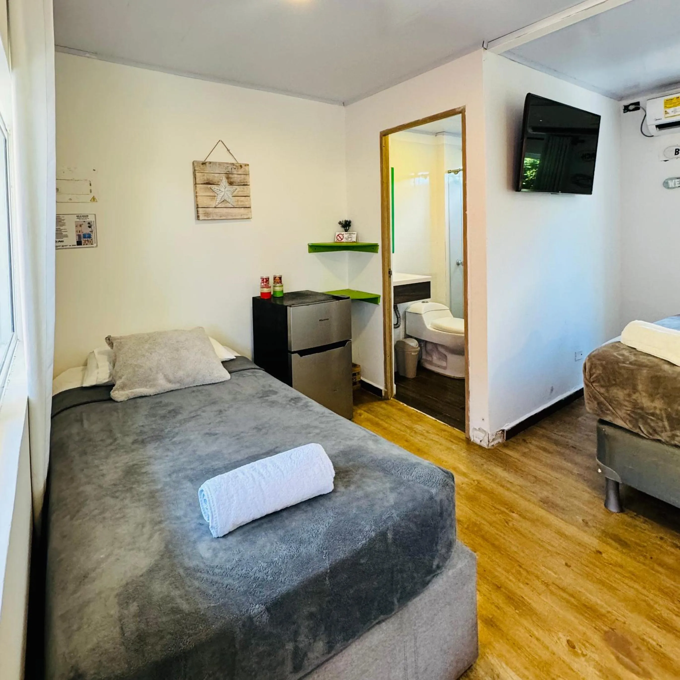 minibar, Bed in Be Happy Hotel