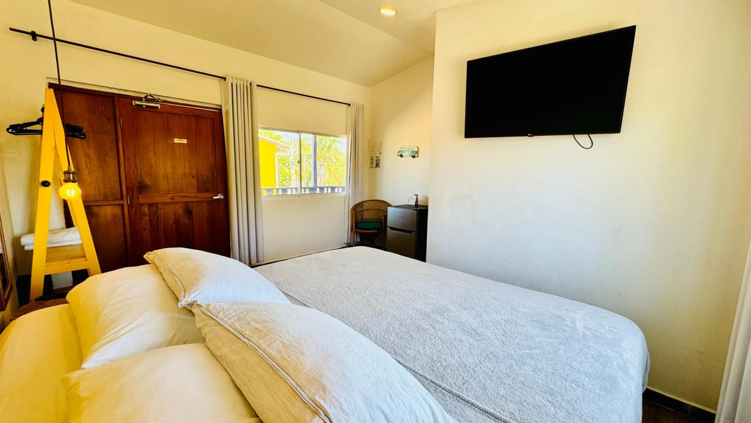 Bed in Be Happy Hotel