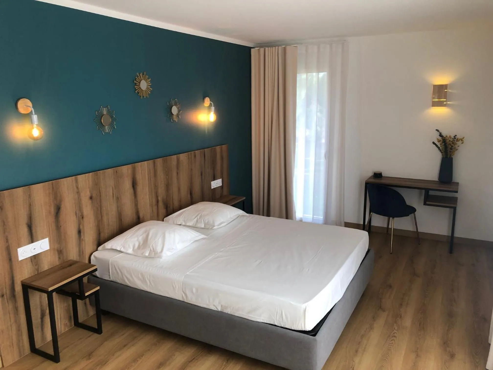 Bed in Auberge les Oliviers