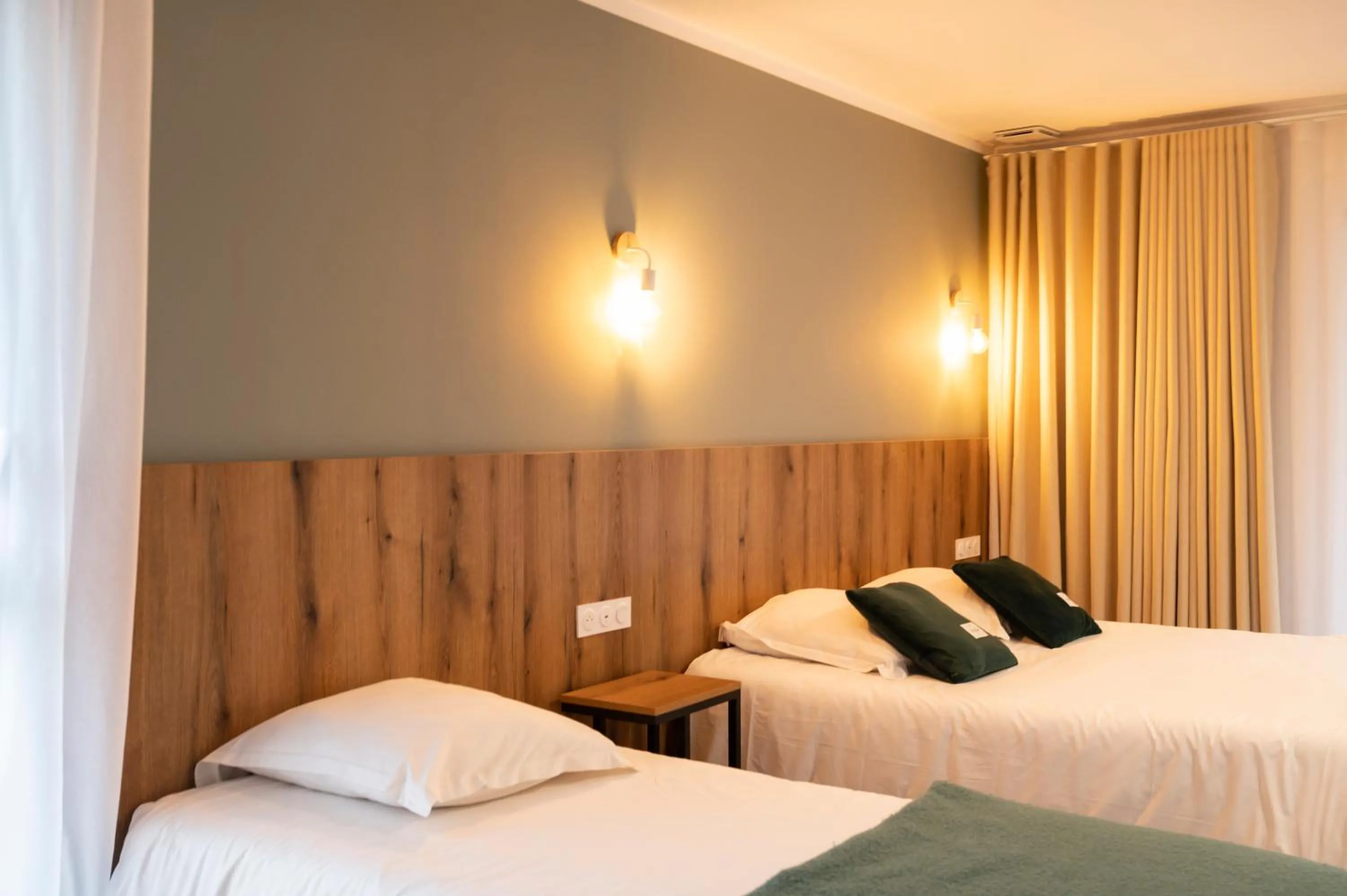 Bed in Auberge les Oliviers