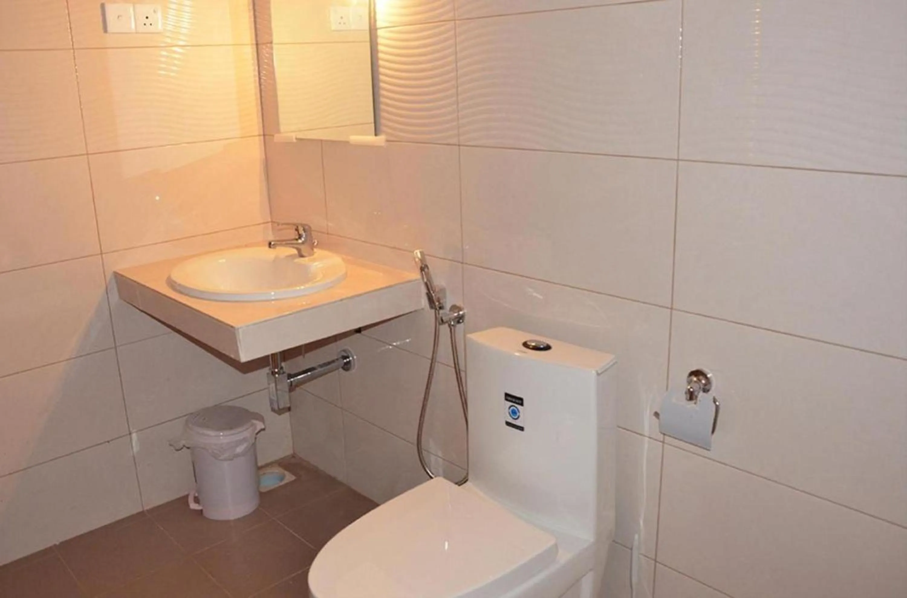 Toilet in Airport Villa