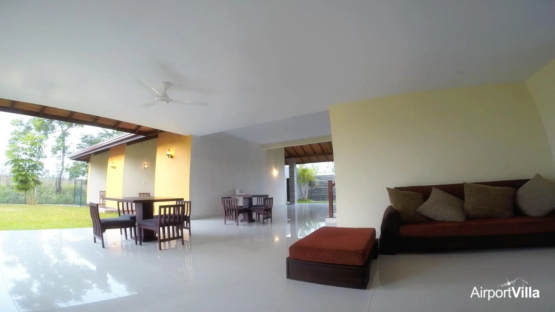 Communal lounge/ TV room in Airport Villa