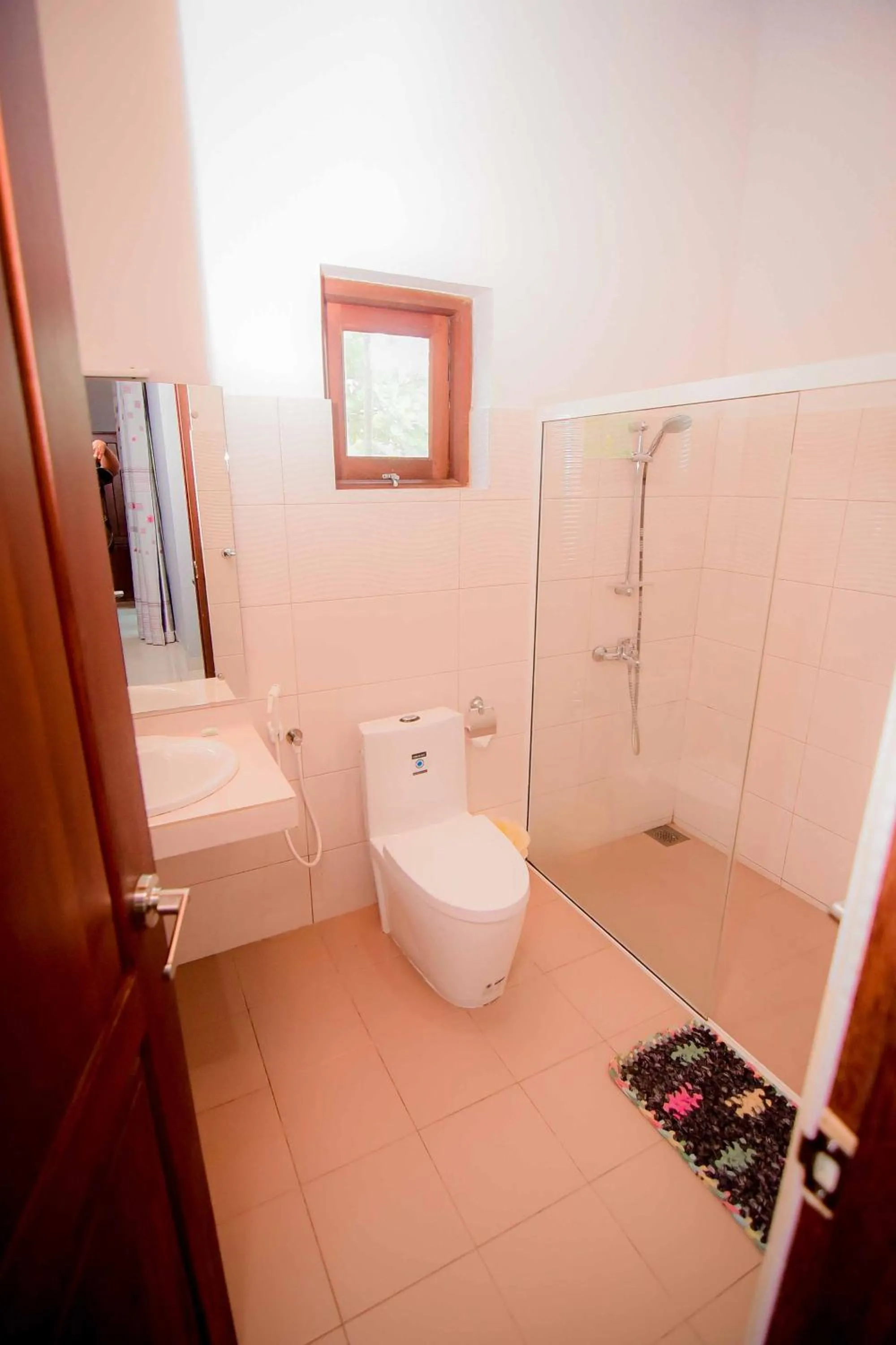 Toilet in Airport Villa