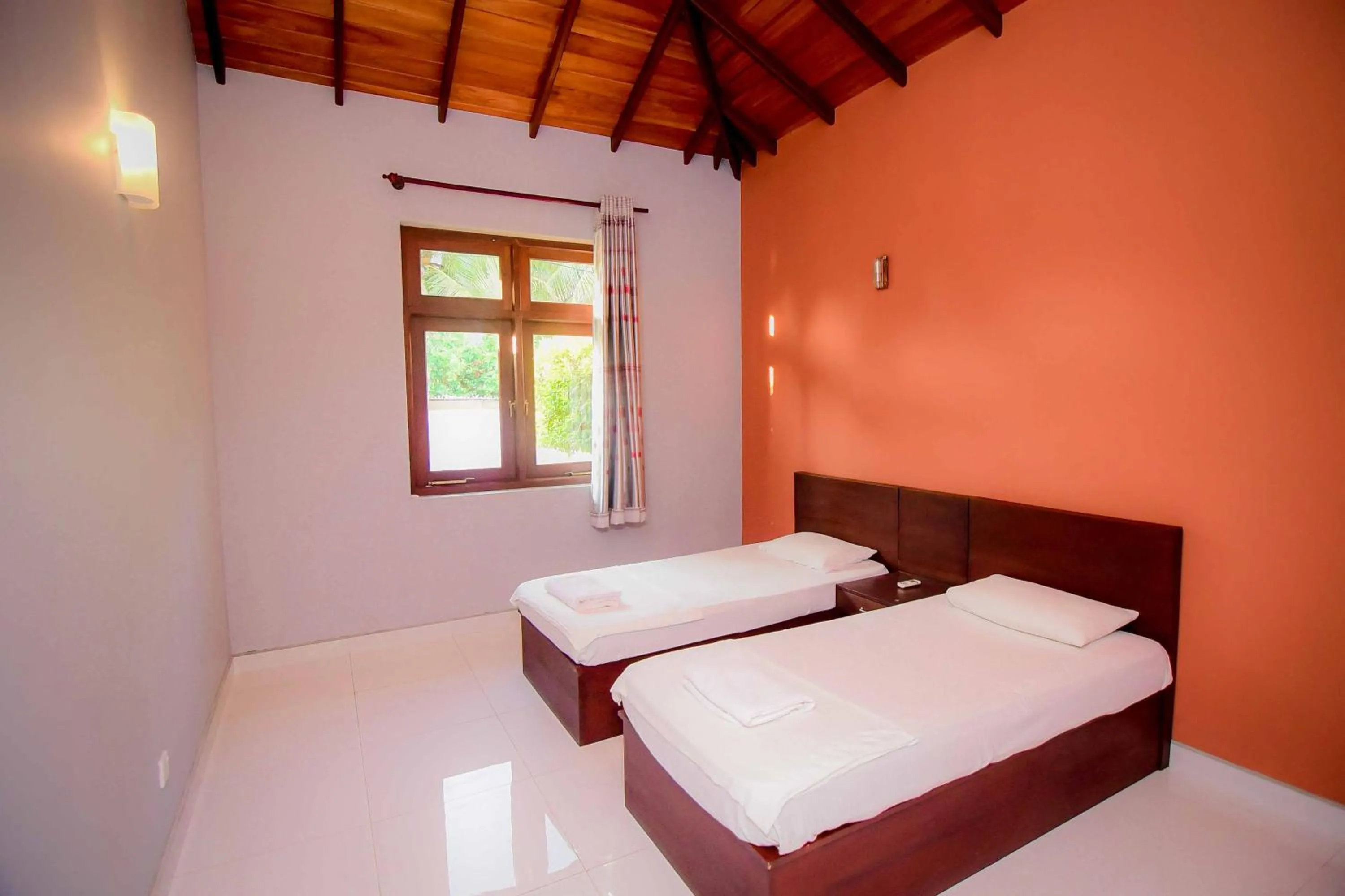 Bed in Airport Villa