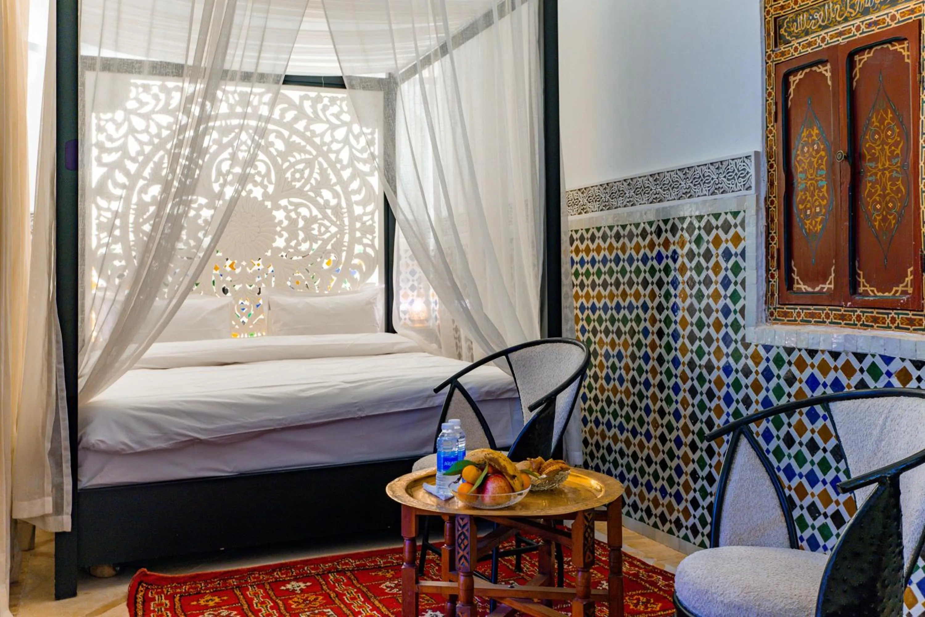 Bed in Riad Dar Dialkoum