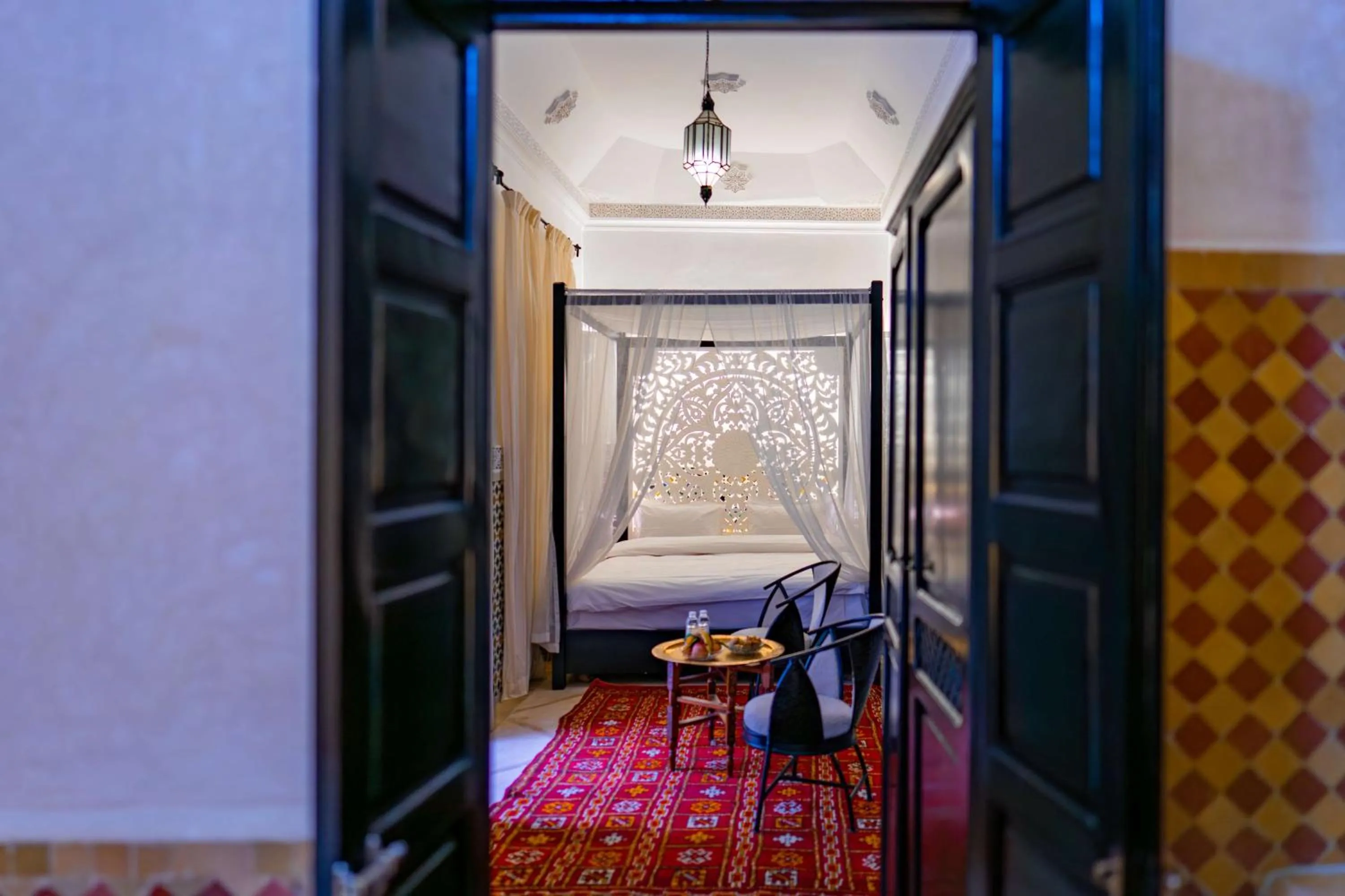 Bed in Riad Dar Dialkoum