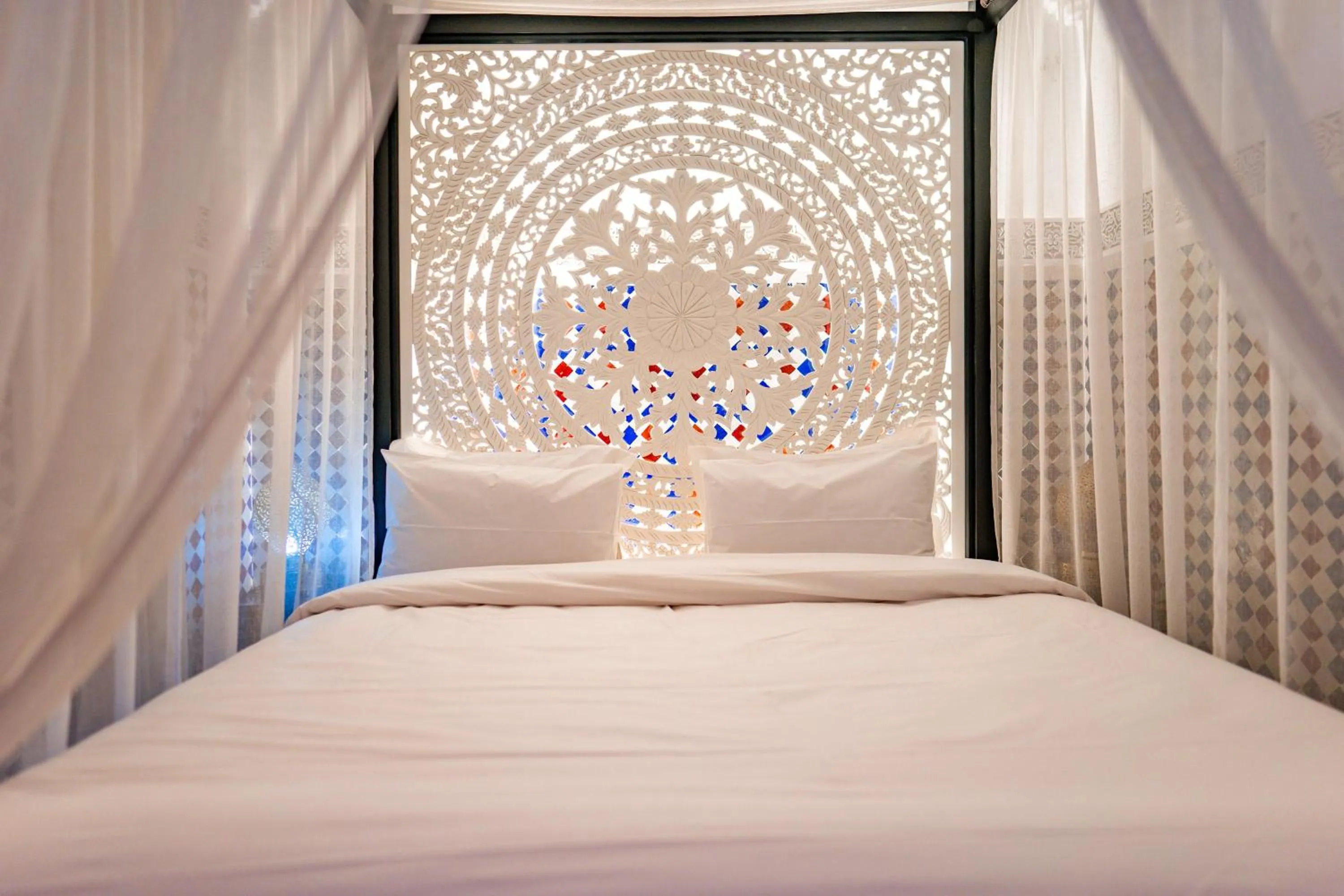 Bed in Riad Dar Dialkoum
