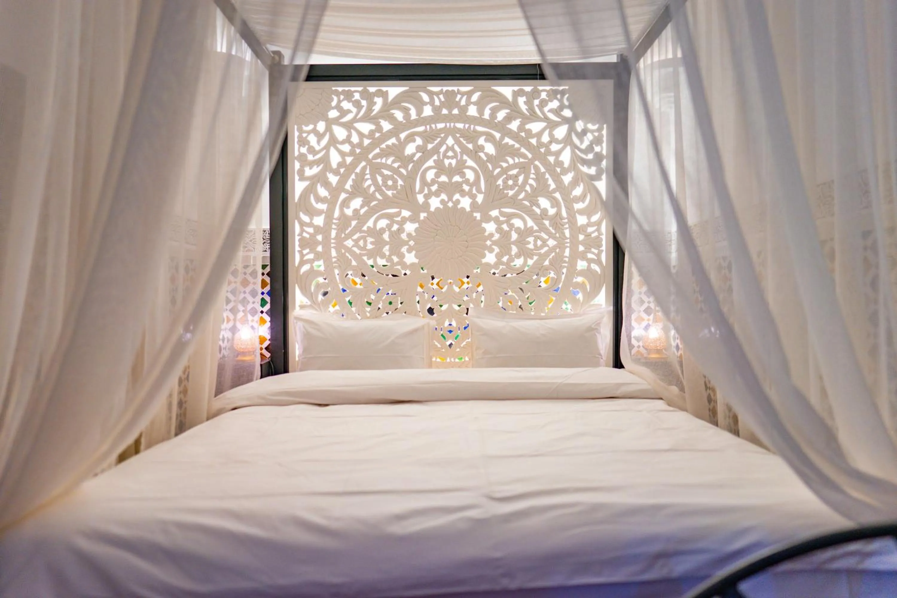 Bed in Riad Dar Dialkoum