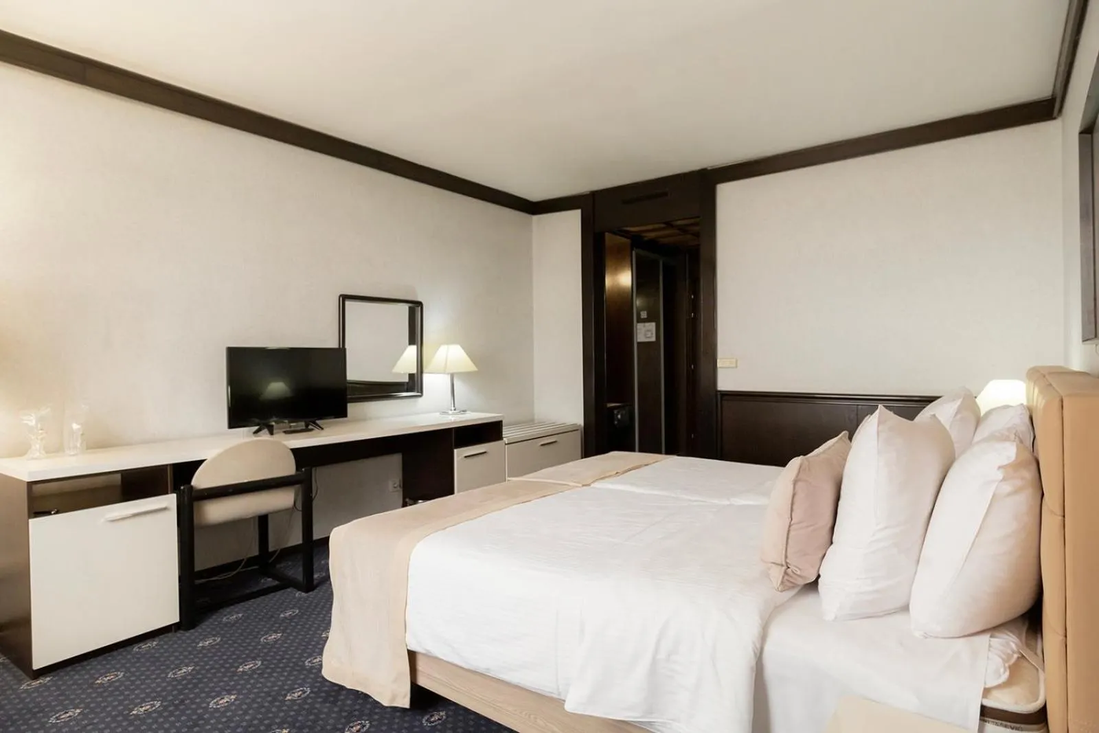 Bed in Hotel Holiday