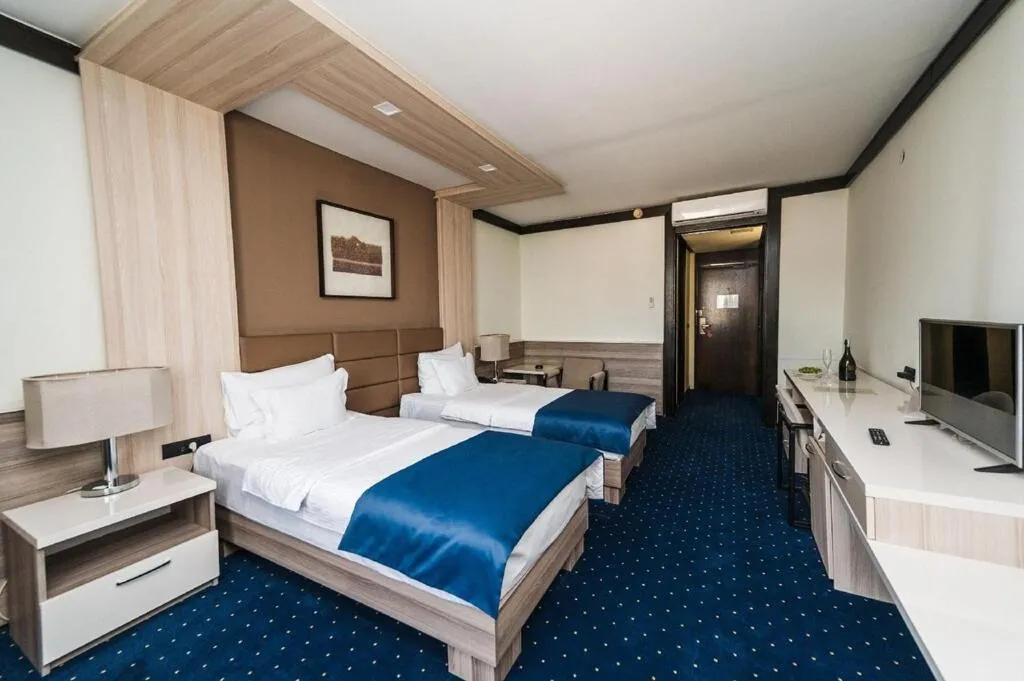 Bed in Hotel Holiday