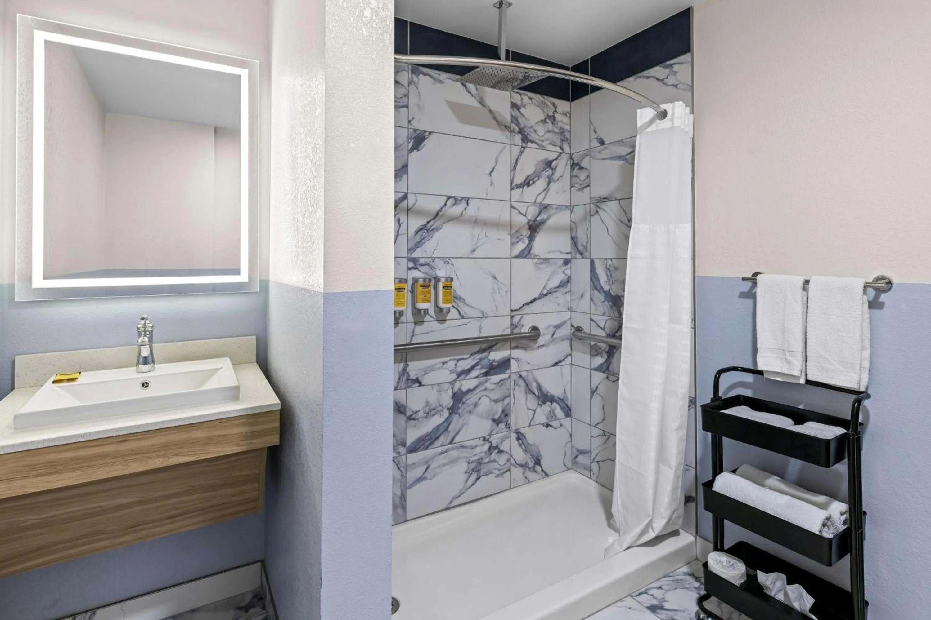 Bathroom in Eva Hotel Buffalo Airport, BW Signature Collection