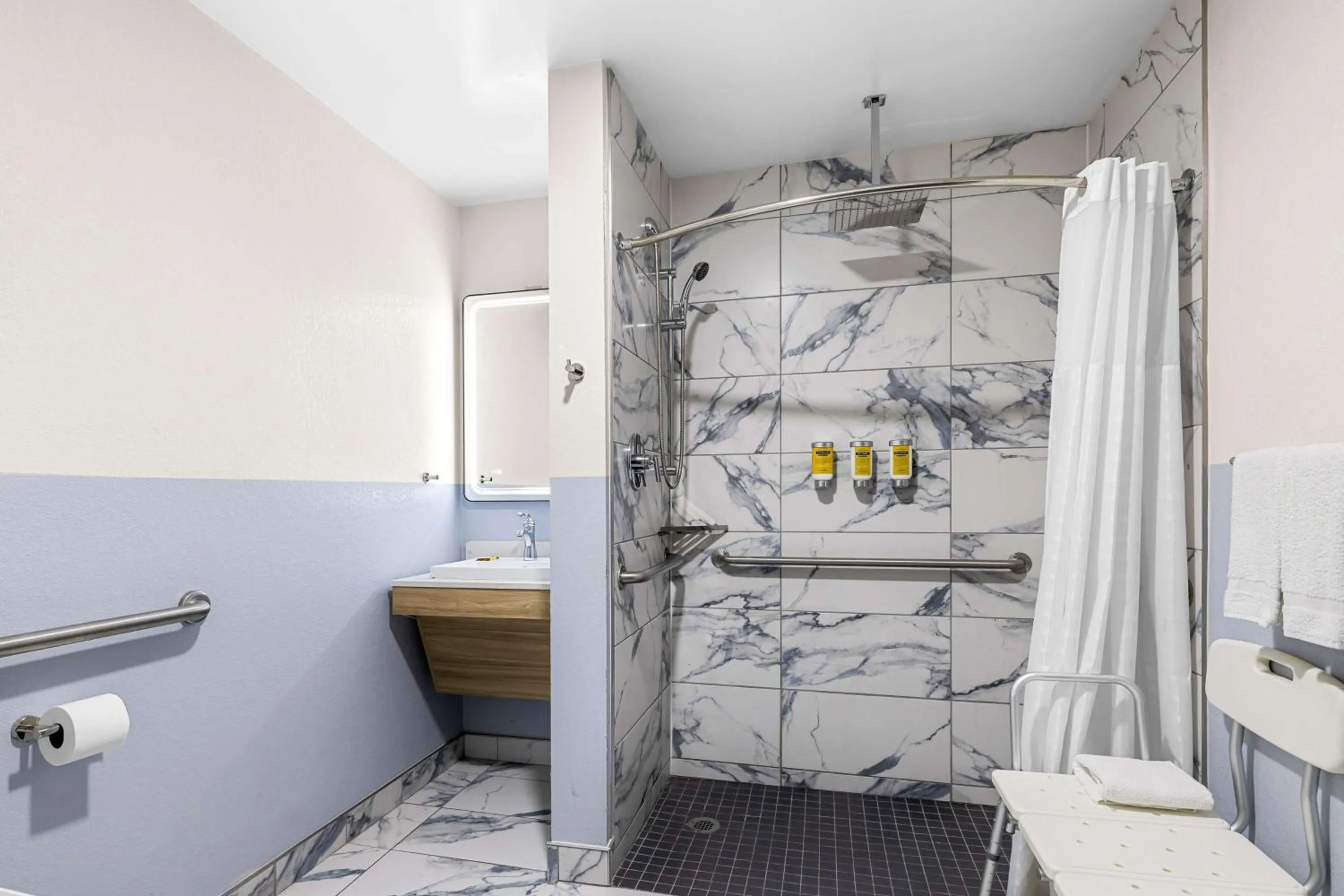 Bathroom in Eva Hotel Buffalo Airport, BW Signature Collection