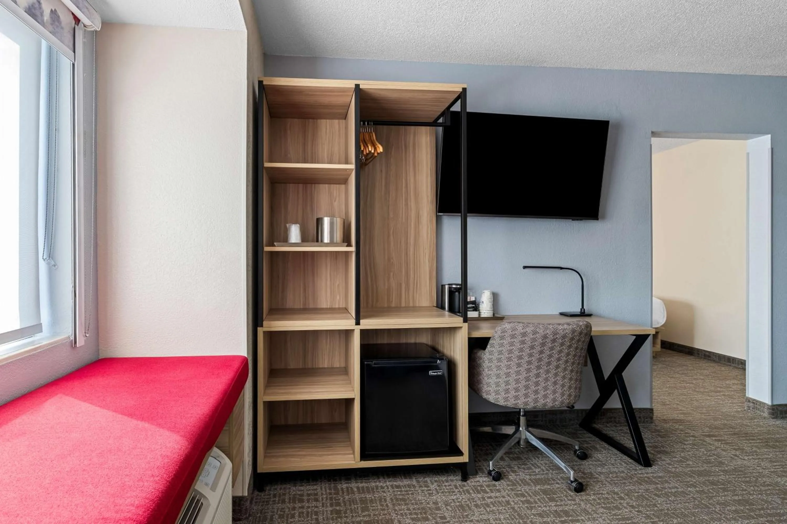 Bedroom in Eva Hotel Buffalo Airport, BW Signature Collection