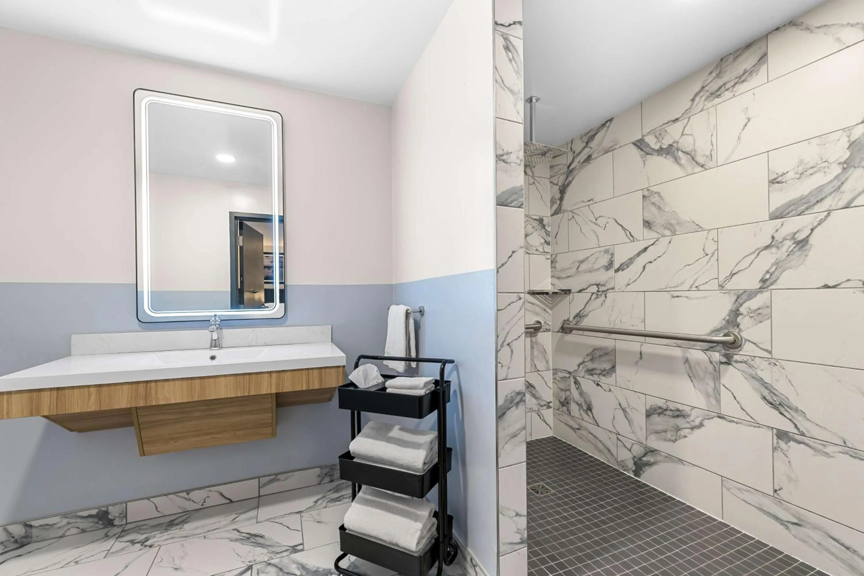 Bathroom in Eva Hotel Buffalo Airport, BW Signature Collection