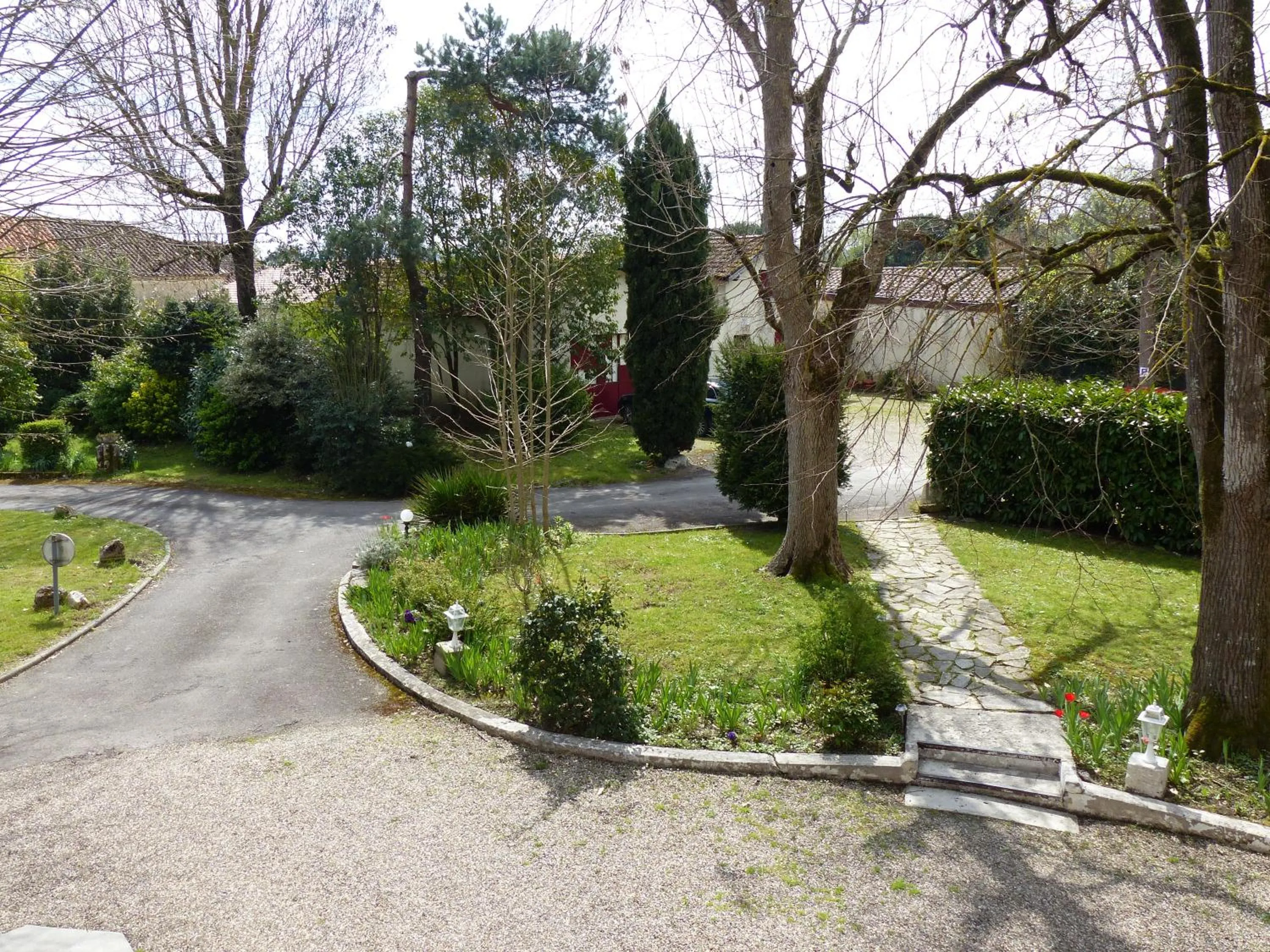 Garden in Logis Hotels - Au Colombier du Touron
