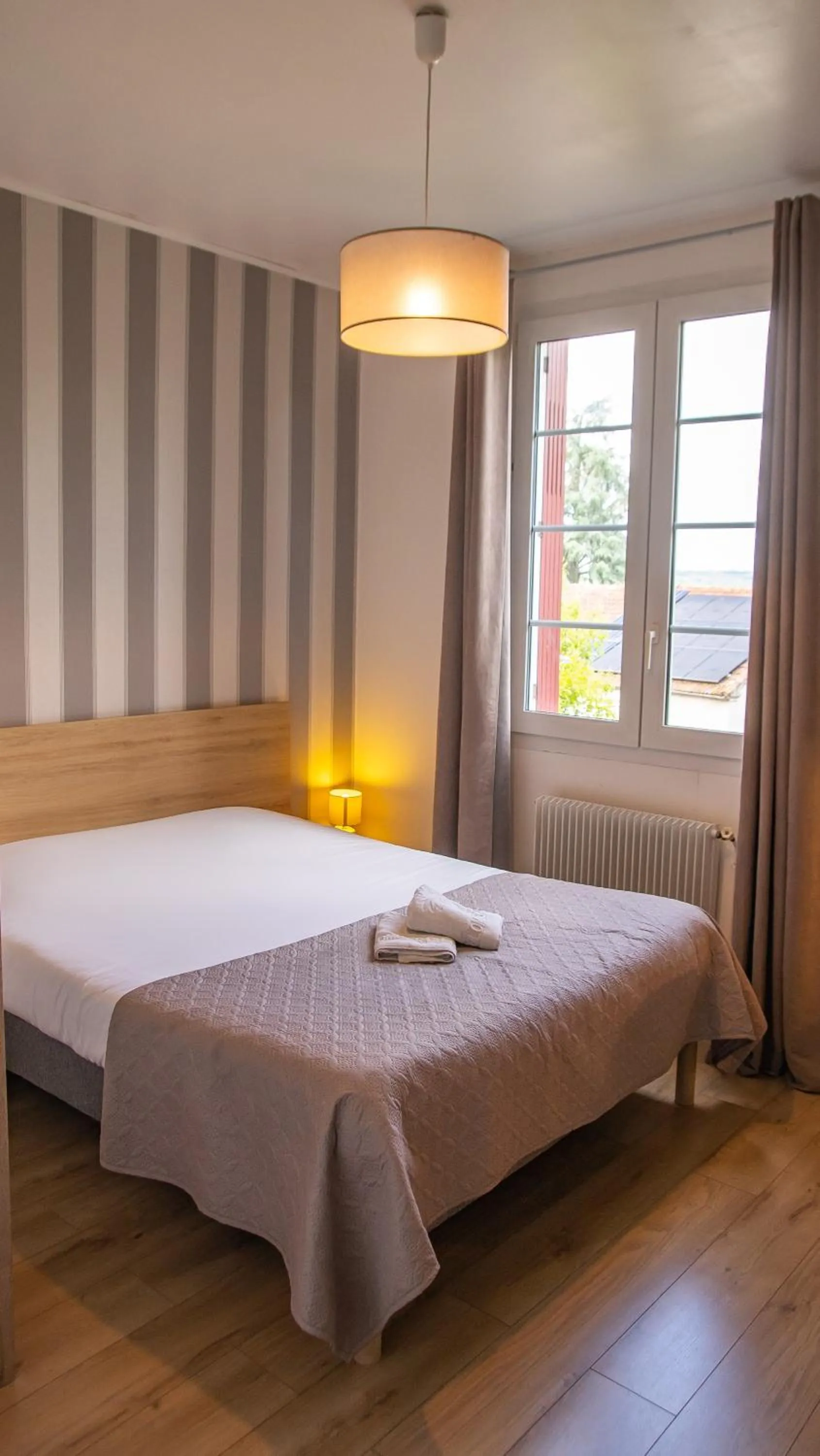 Bed in Logis Hotels - Au Colombier du Touron