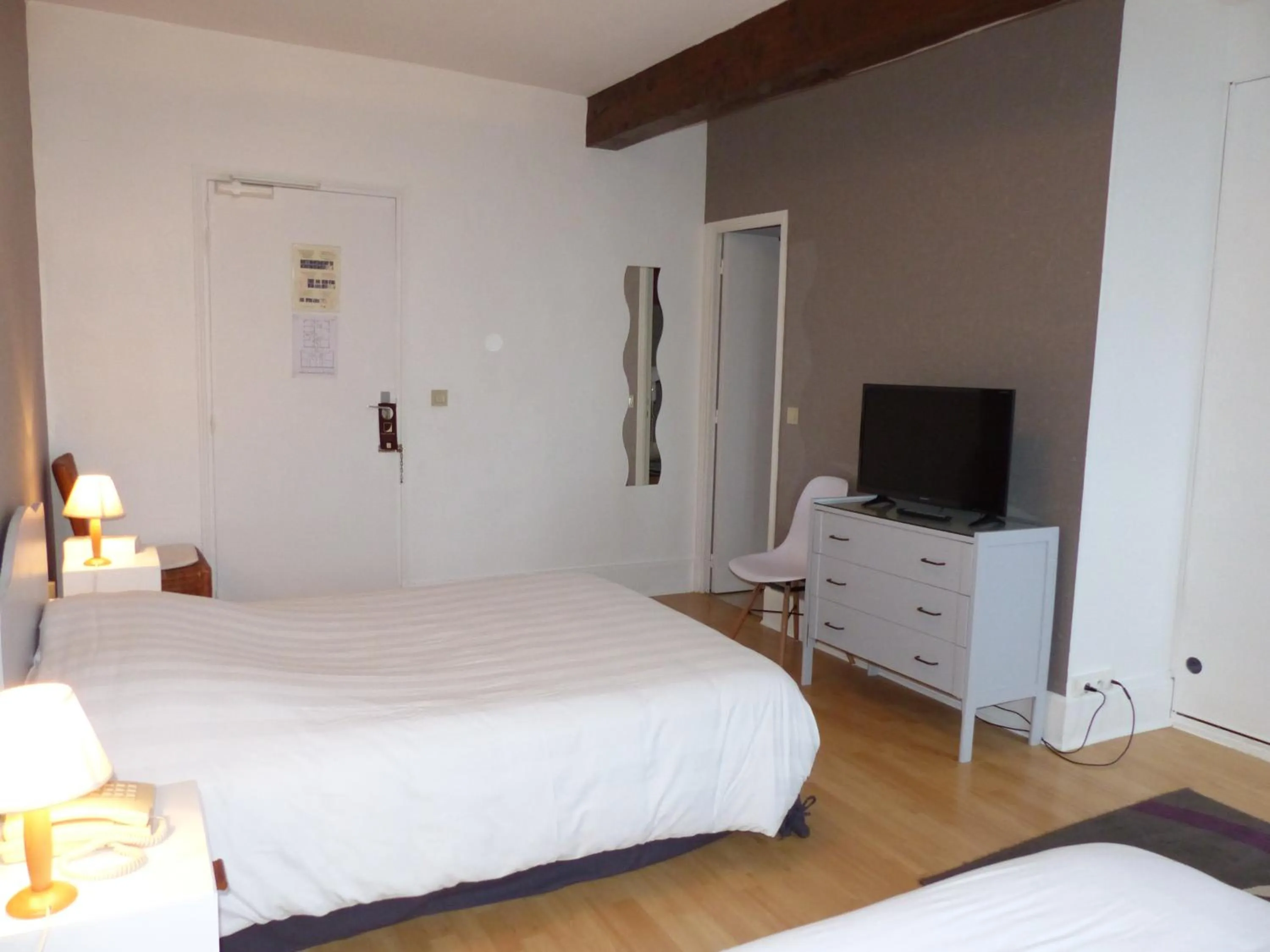 Decorative detail, Bed in Logis Hotels - Au Colombier du Touron