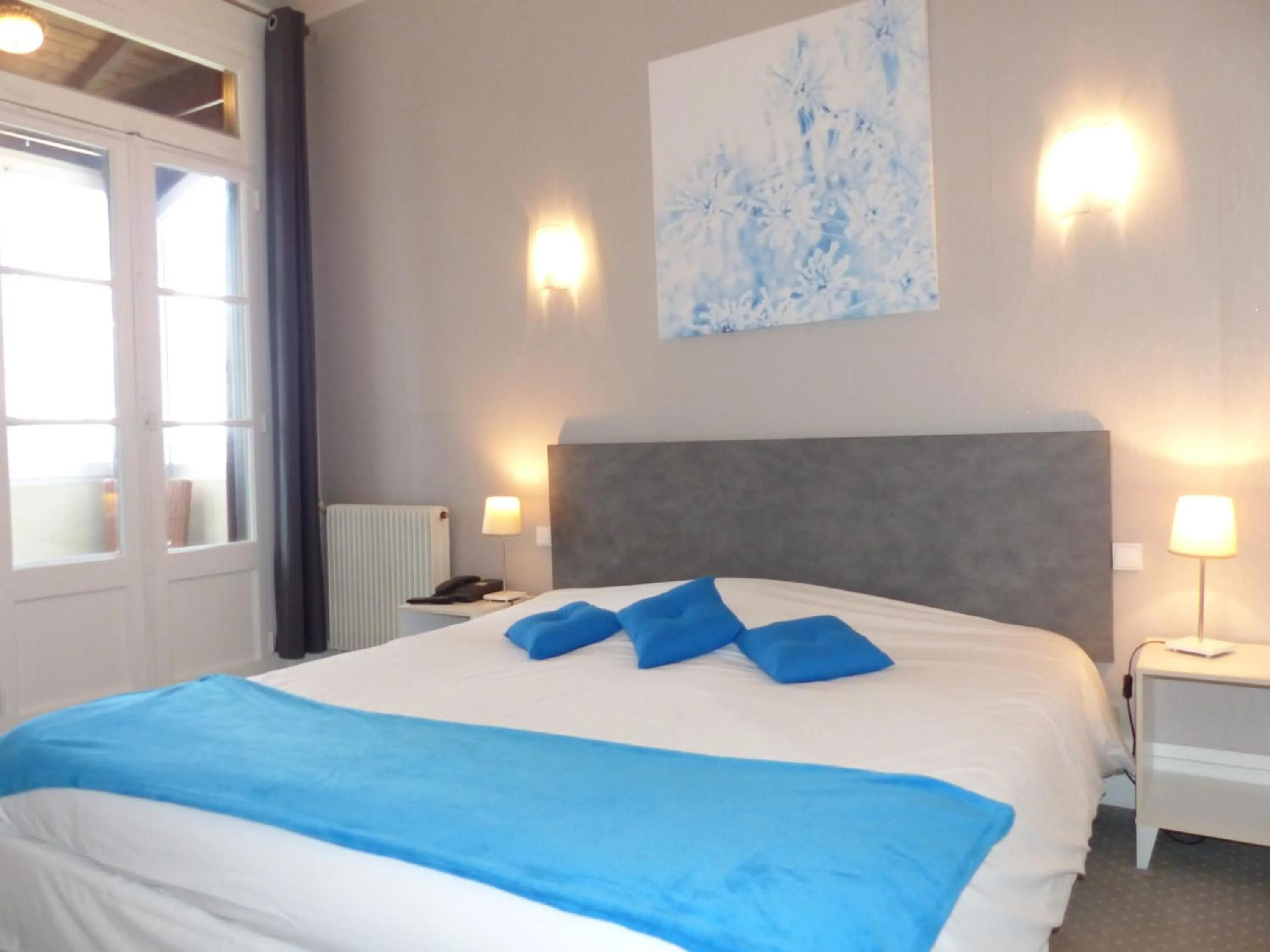 Bedroom, Bed in Logis Hotels - Au Colombier du Touron