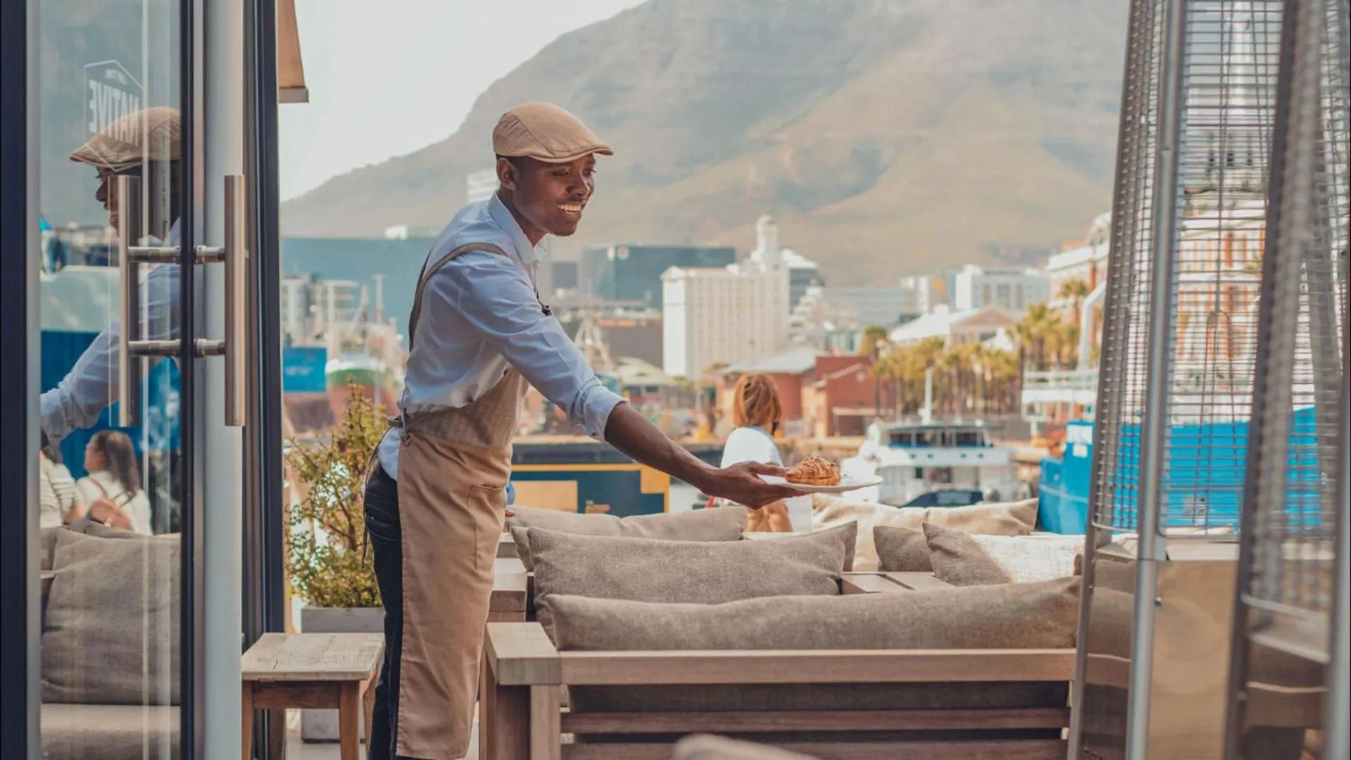 People in Victoria & Alfred Hotel by NEWMARK