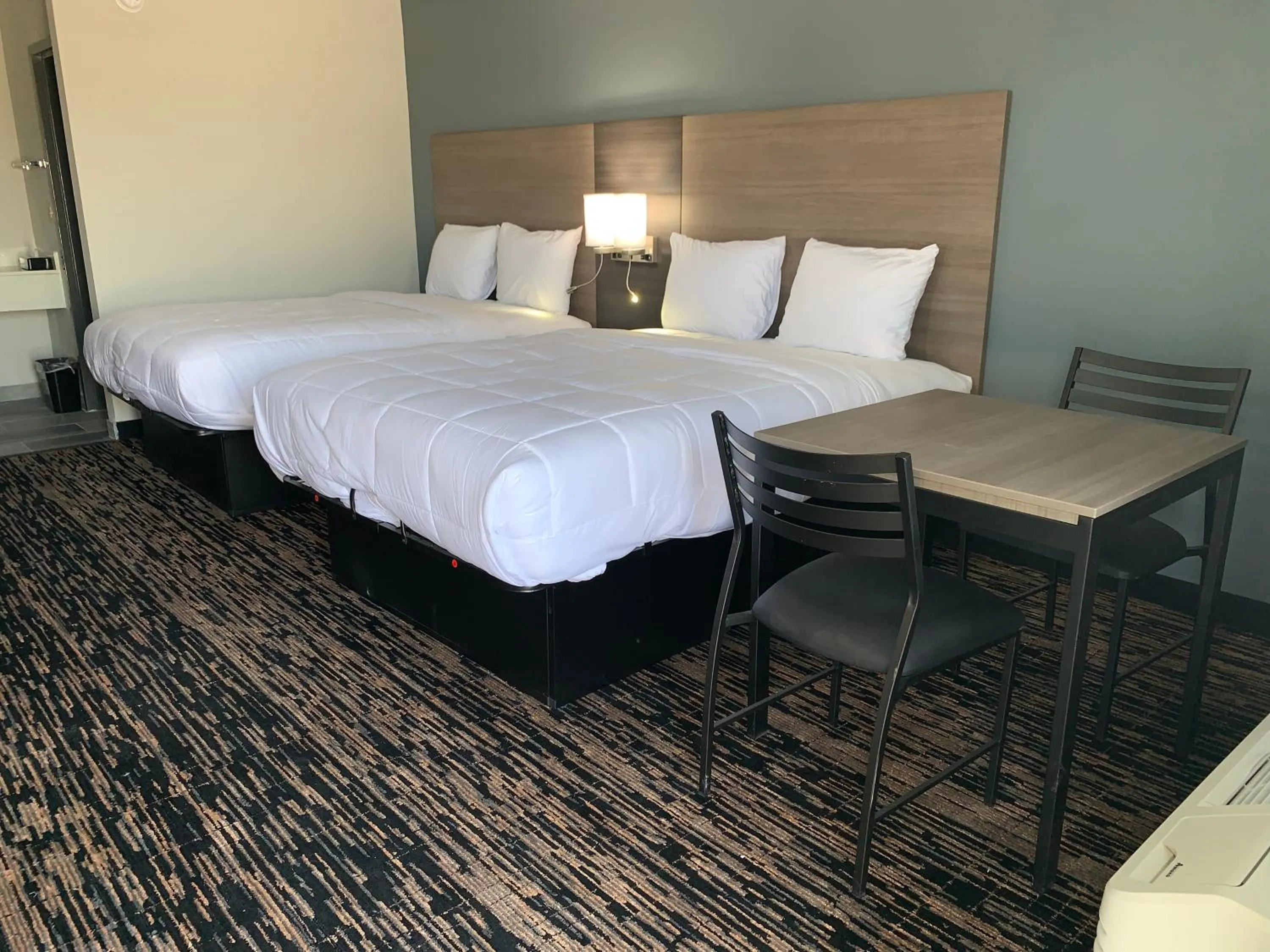 Bed in Super 8 by Wyndham Sulphur South