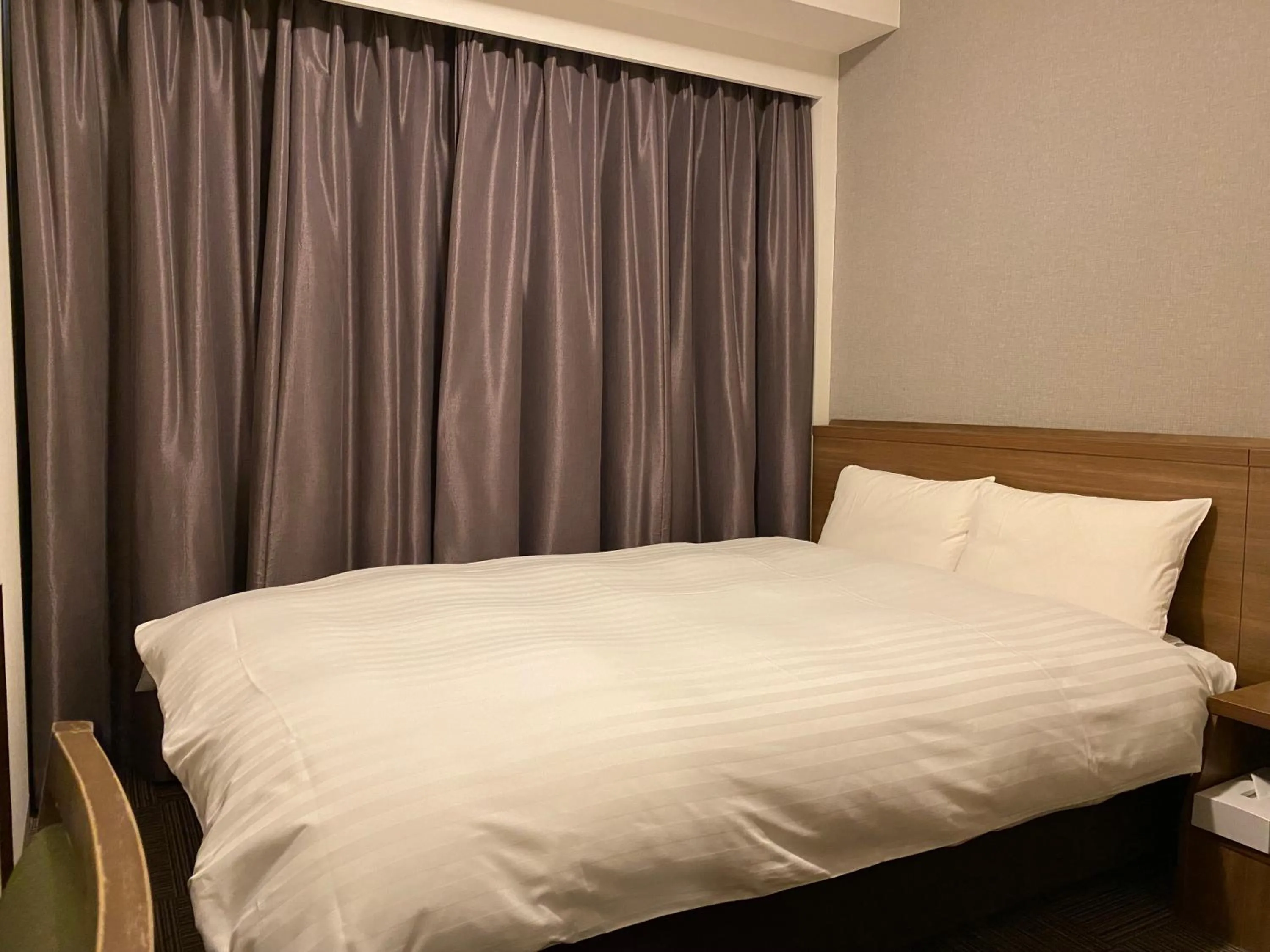 Bed in Dormy Inn Morioka