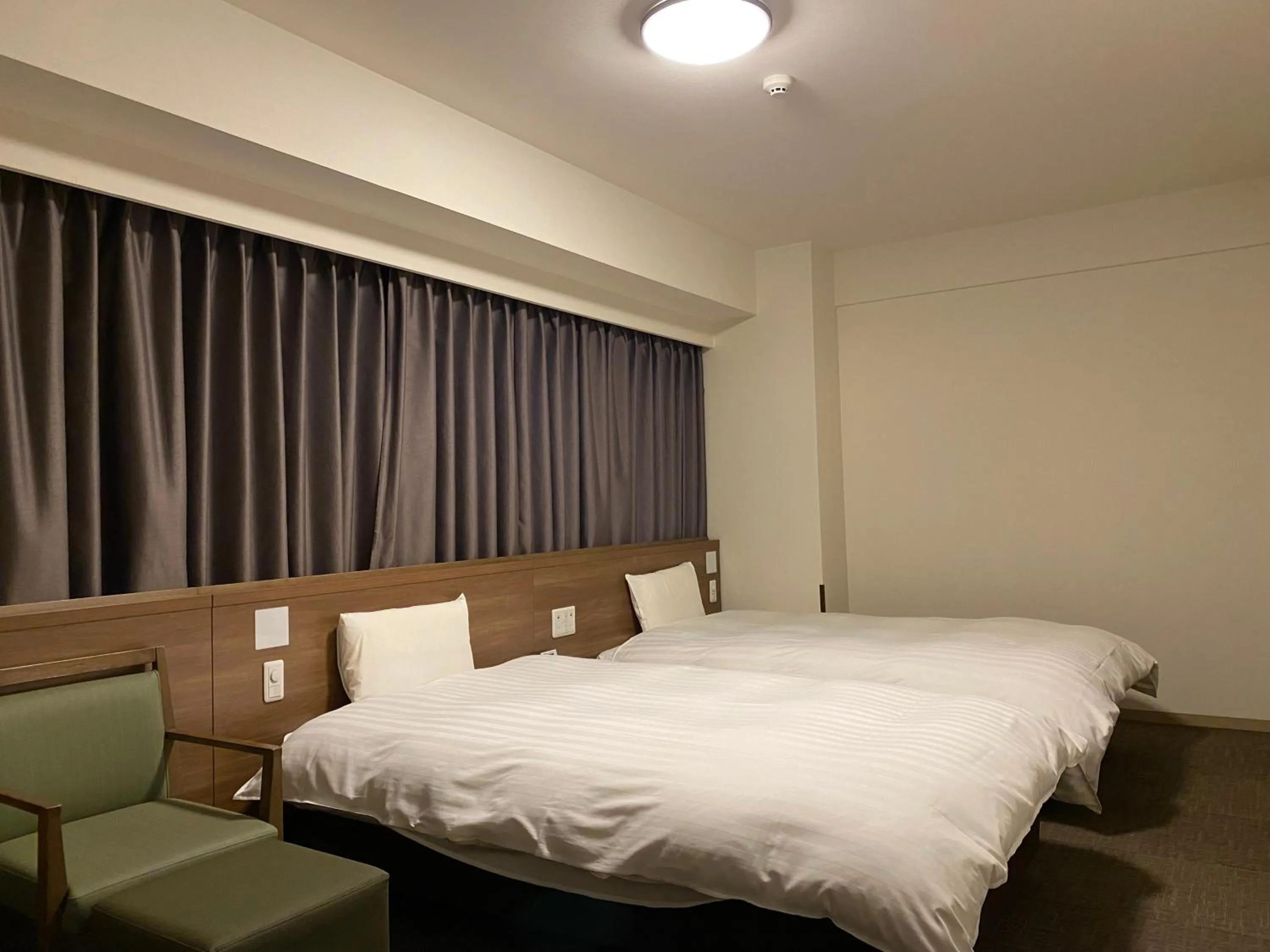 Bed in Dormy Inn Morioka