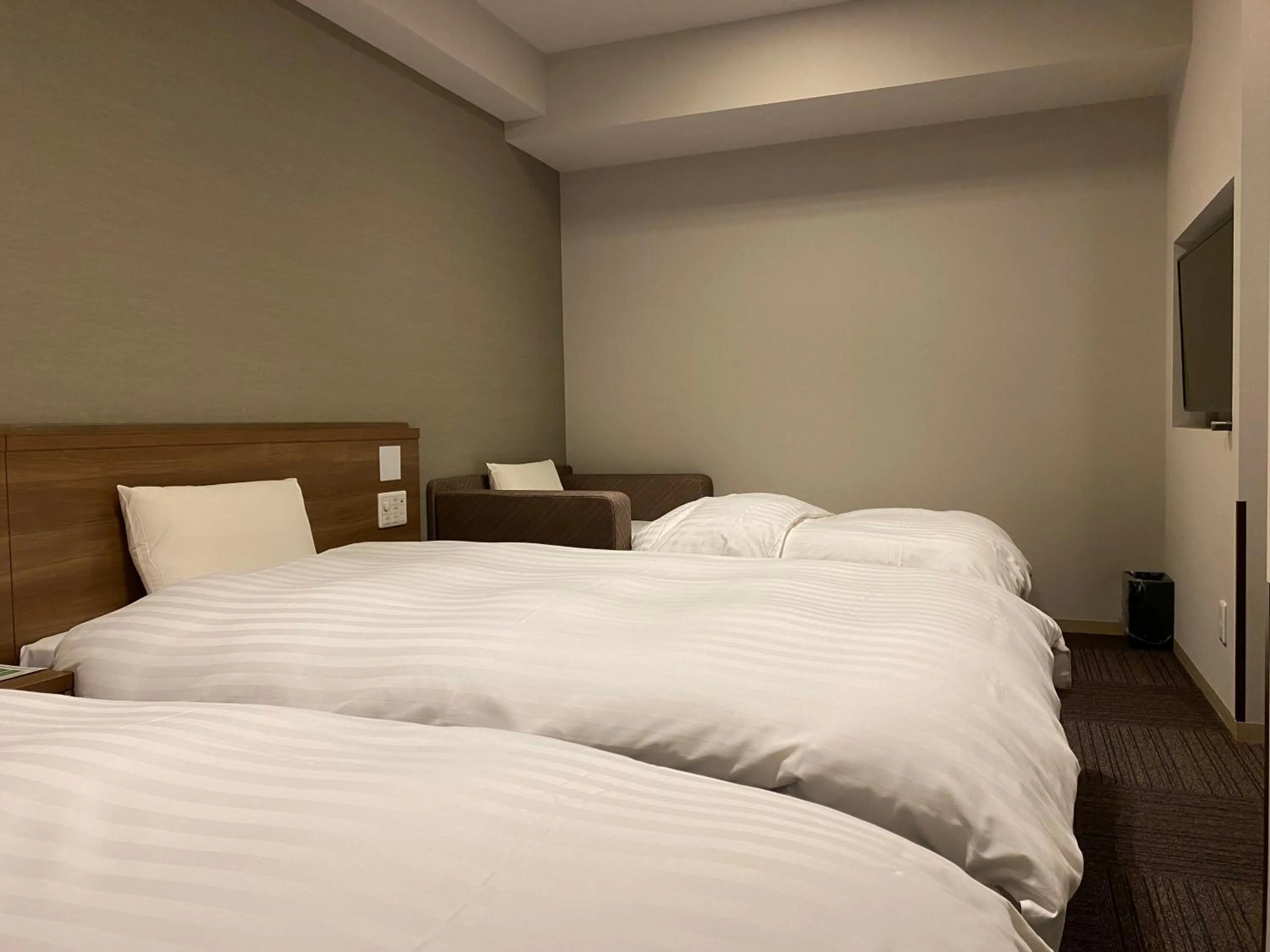 Bed in Dormy Inn Morioka