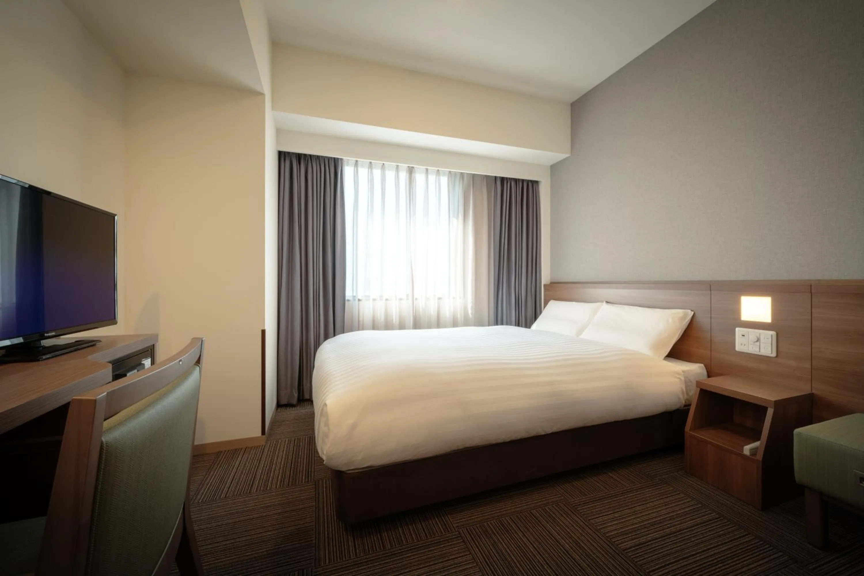 Bed in Dormy Inn Morioka