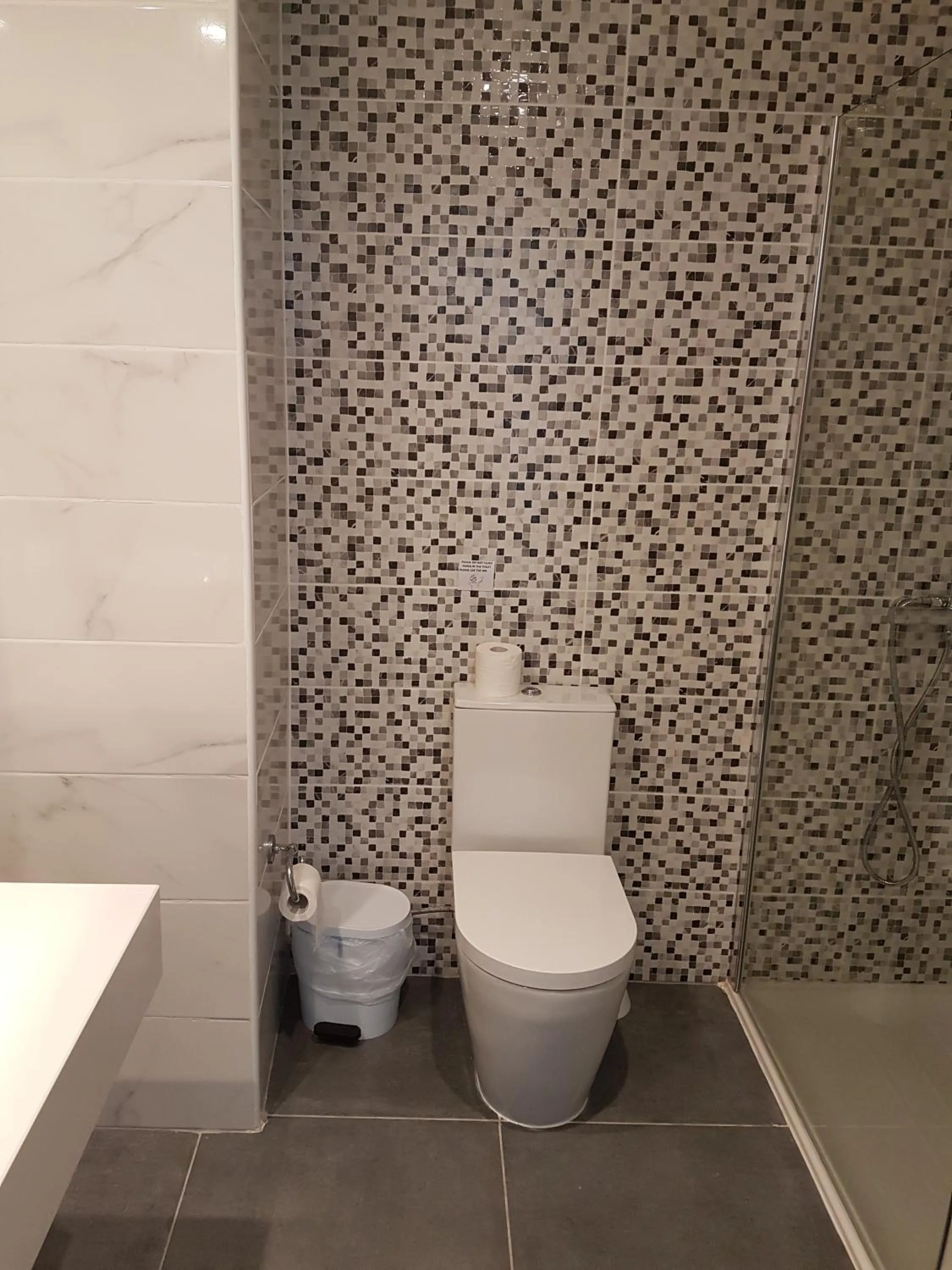 Bathroom in Melini Hotel Suites