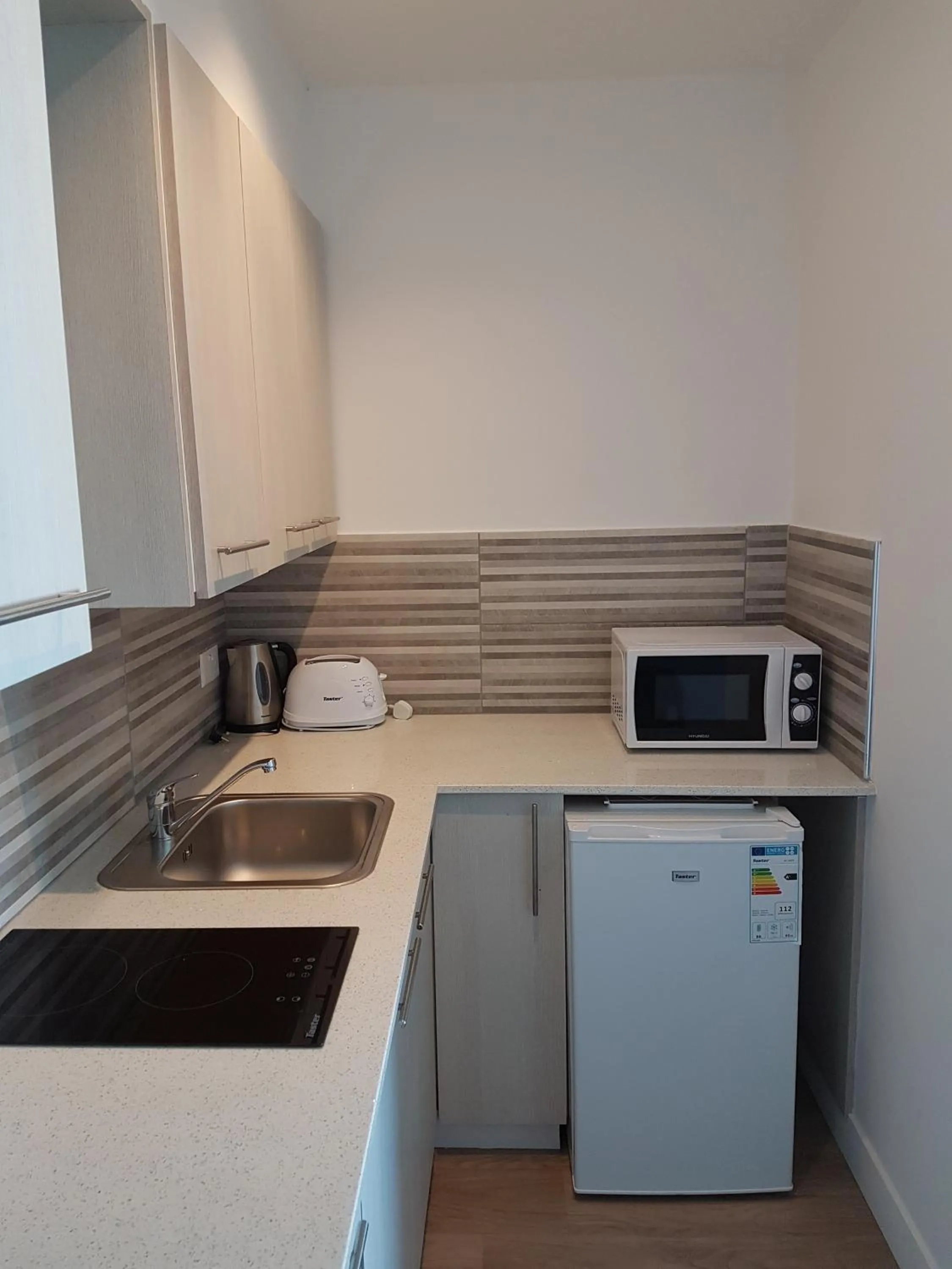 Kitchen or kitchenette in Melini Hotel Suites